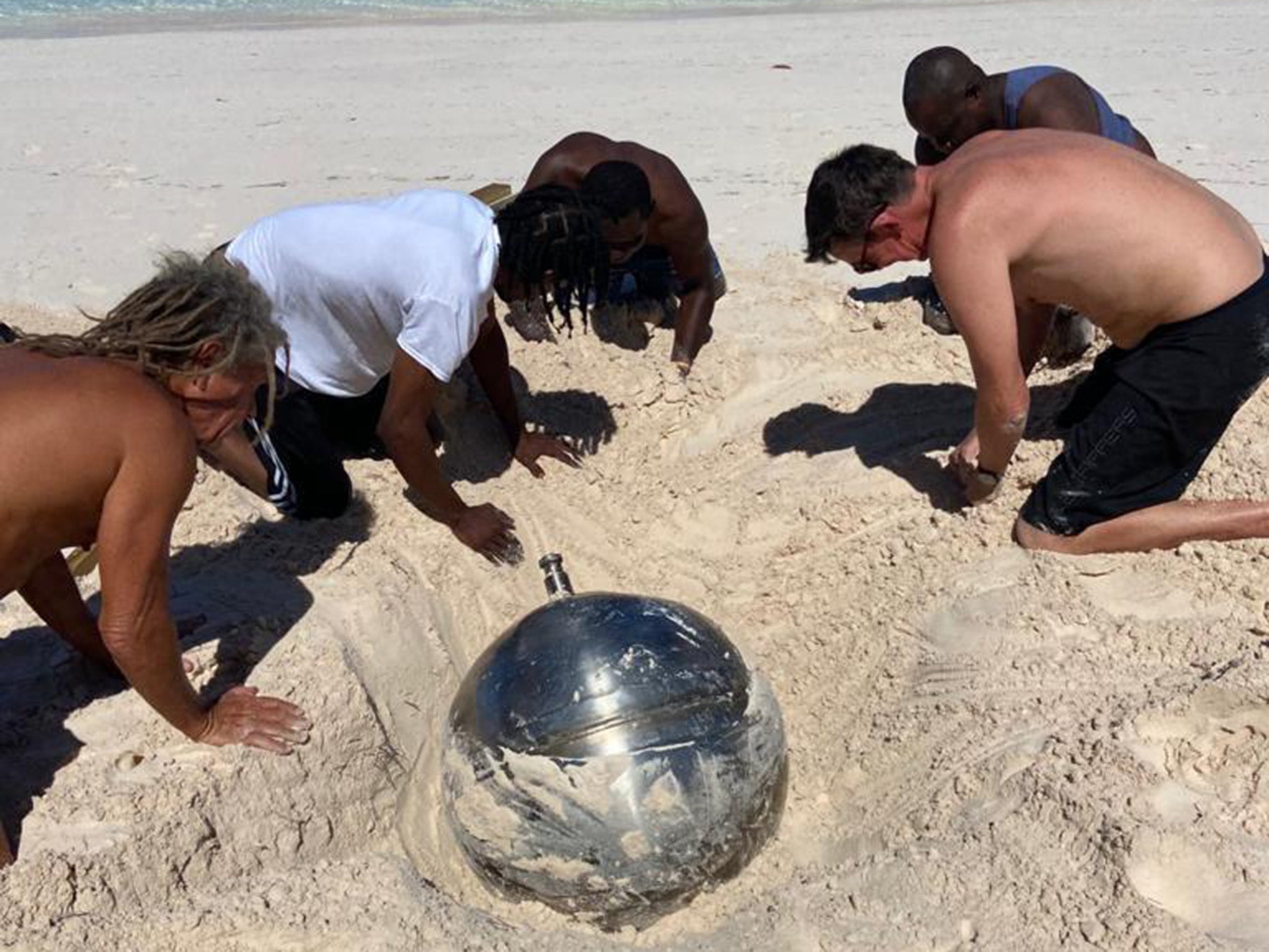 Locals dug the object out of the sand