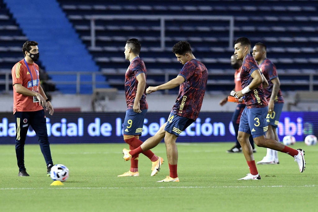 Steven Alzate warming up with Radamel Falcao for Colombia