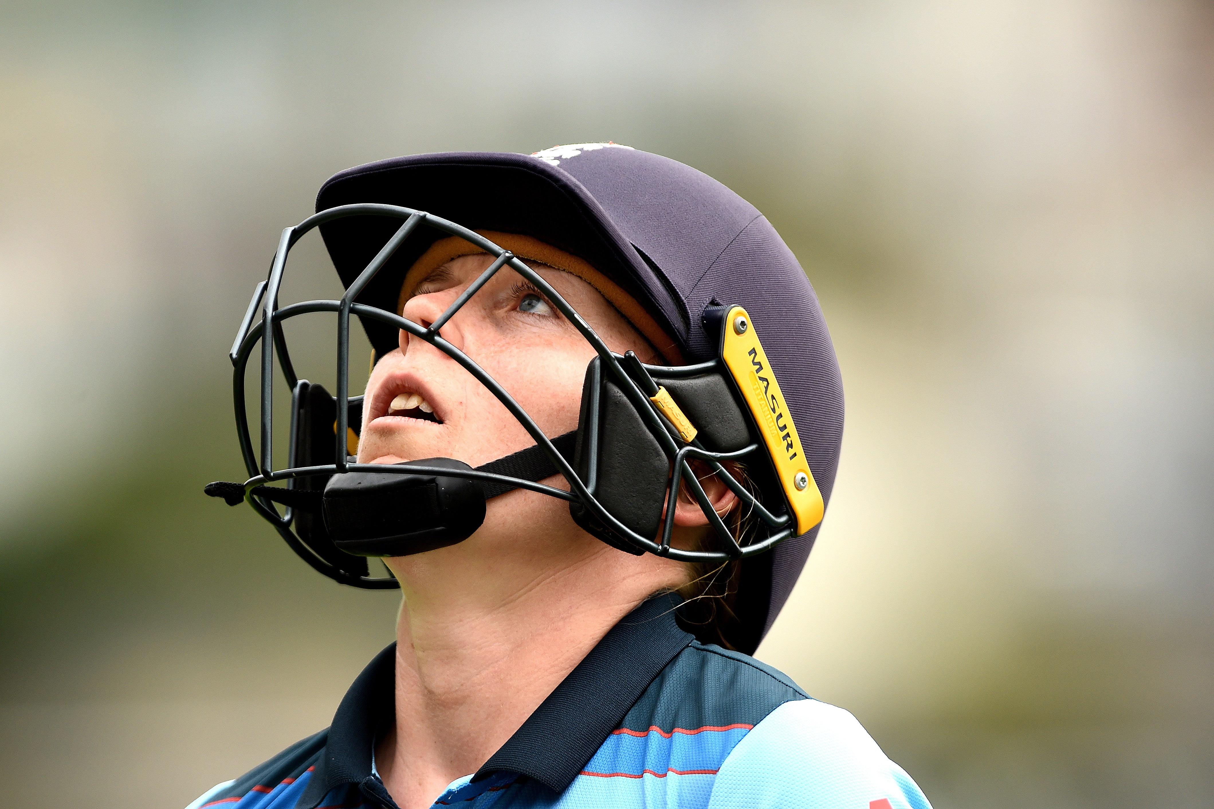 Heather Knight leaves the field after being dismissed