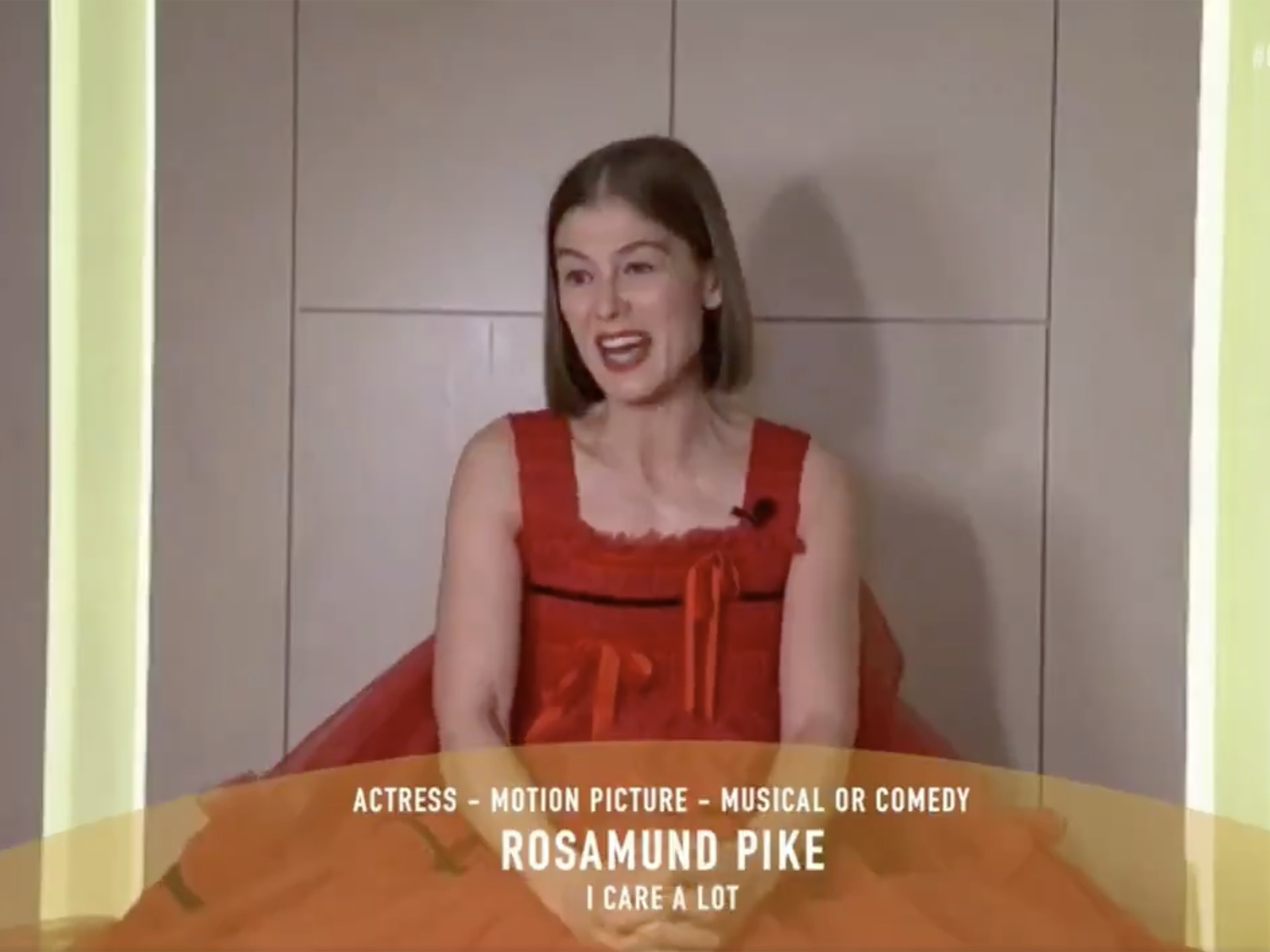 Rosamund Pike collects her Best Actress award at the Golden Globes