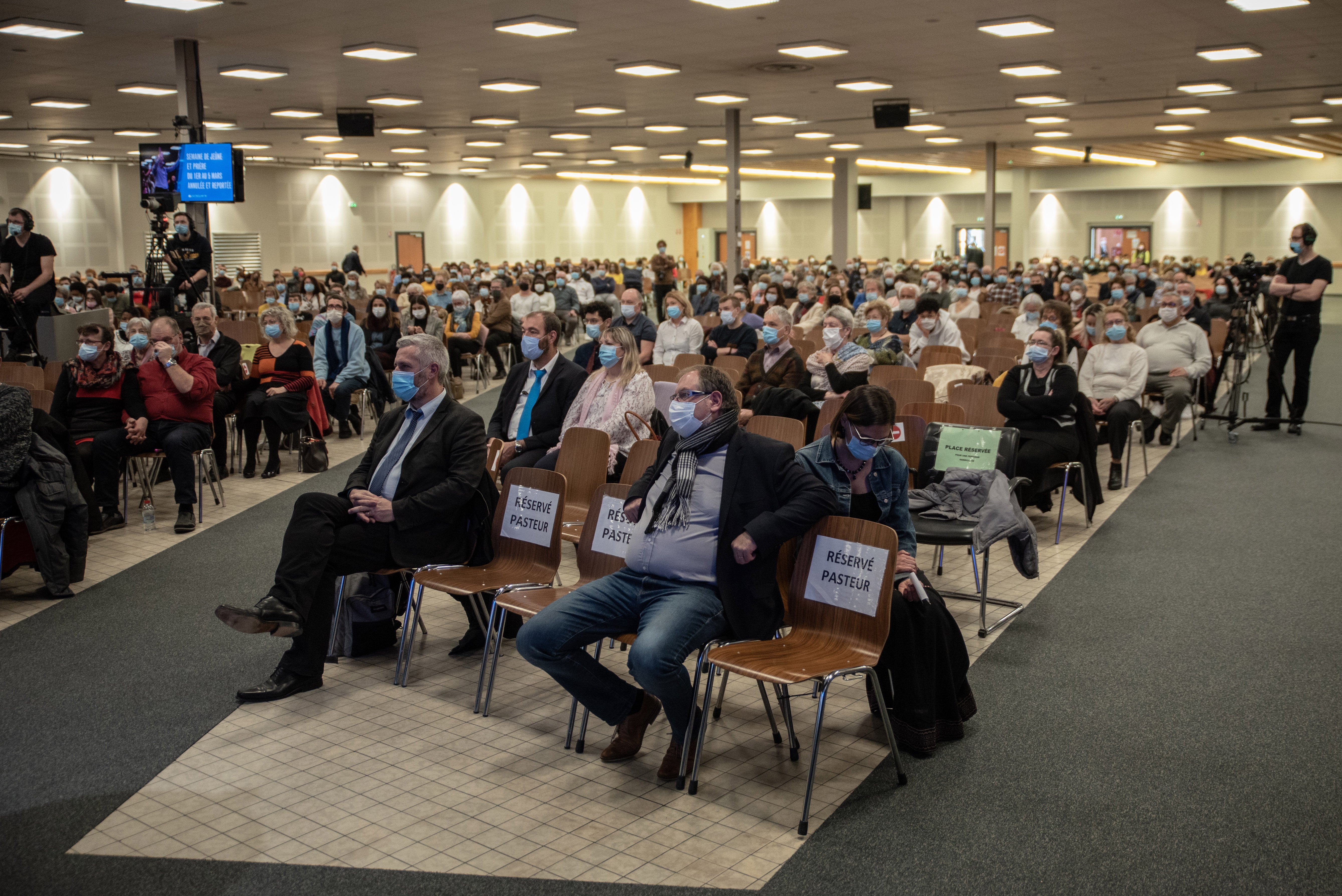 Close to 600 people attend a service at the Christian Open Door church in Mulhouse, France, a year after the ‘superspreader’ event