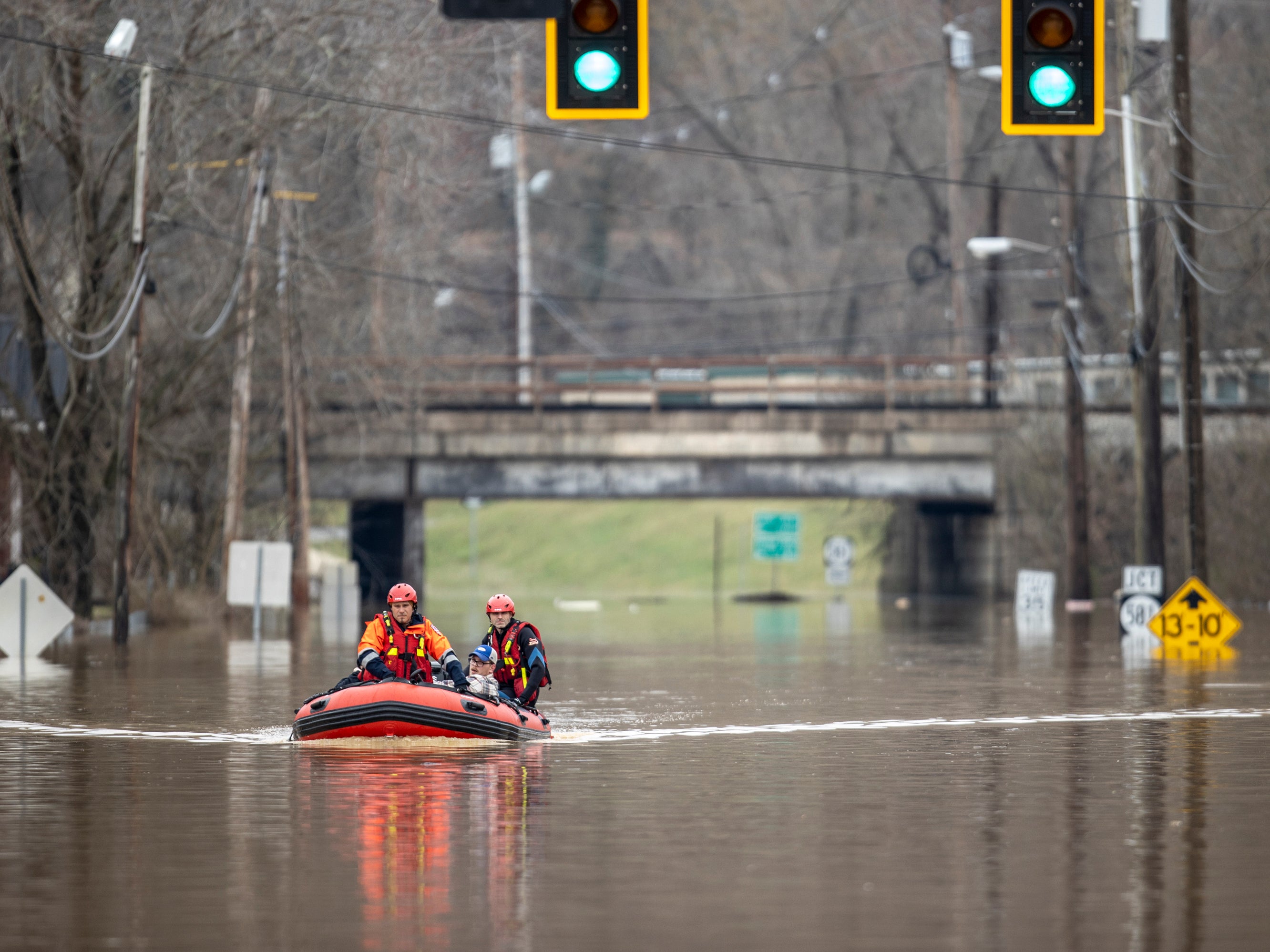 Covid vaccines rescued by boat after heavy rain causes flooding in Kentucky