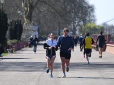 Joggers should wear face masks when running past others, scientists say