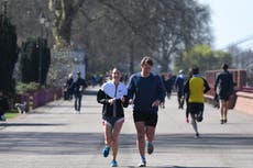 Joggers should wear face masks when running past others, scientists say