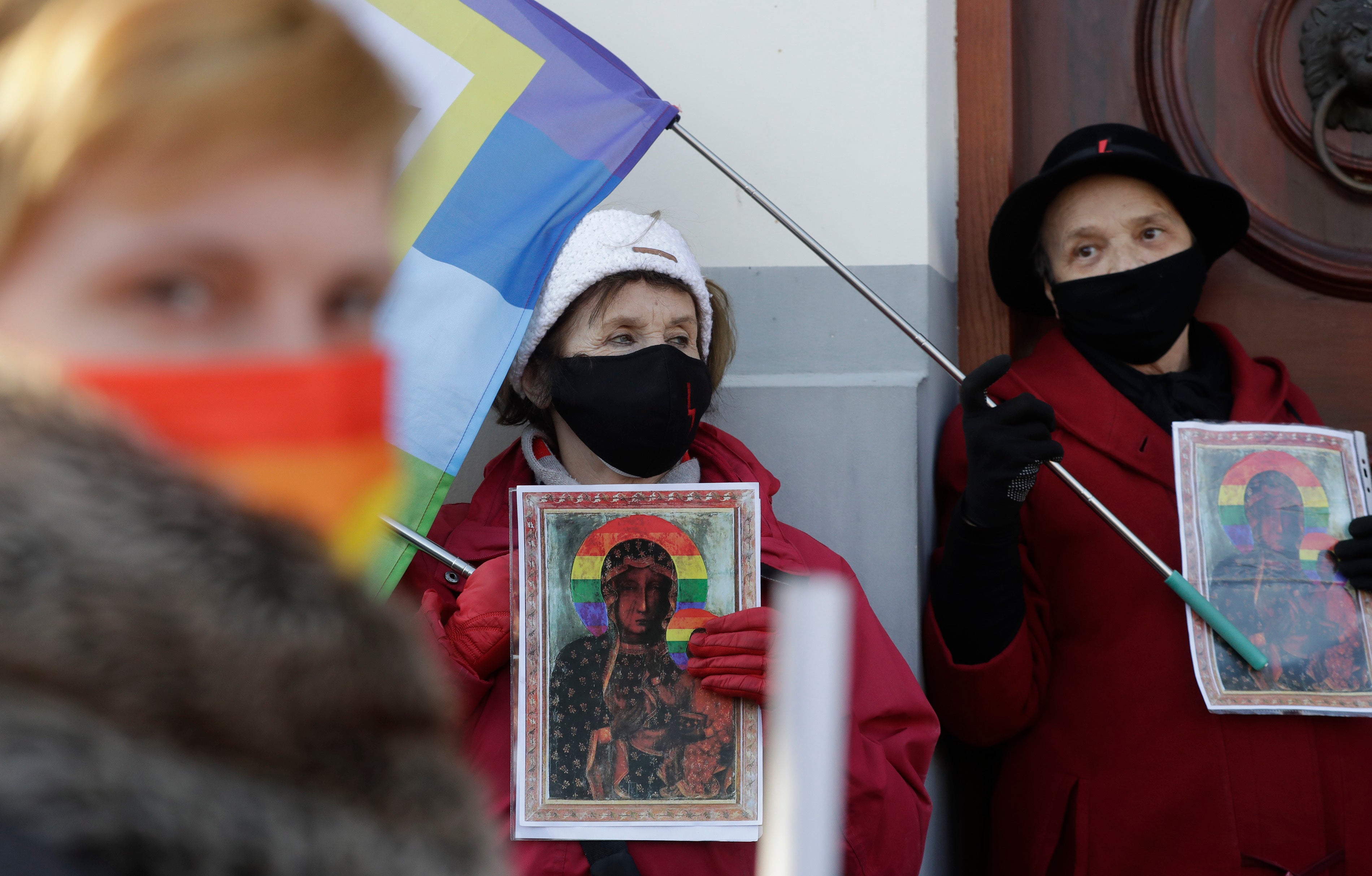 Polish LGBT+ rights activists assemble outside a court which acquitted three women found not guilty of ‘offending religious beliefs’ in court