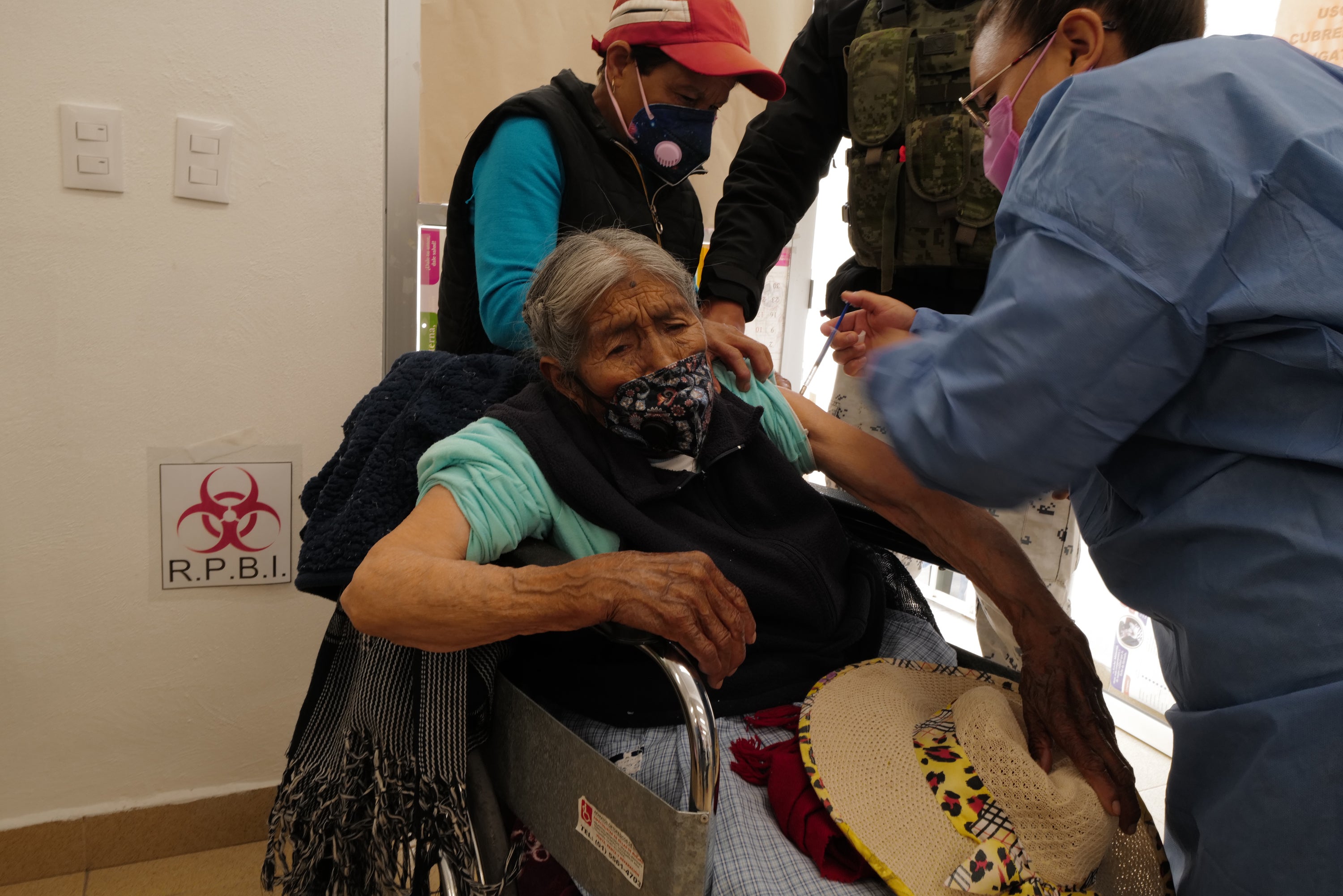 Dominga Orozco Quijano, 100, receives her vaccine