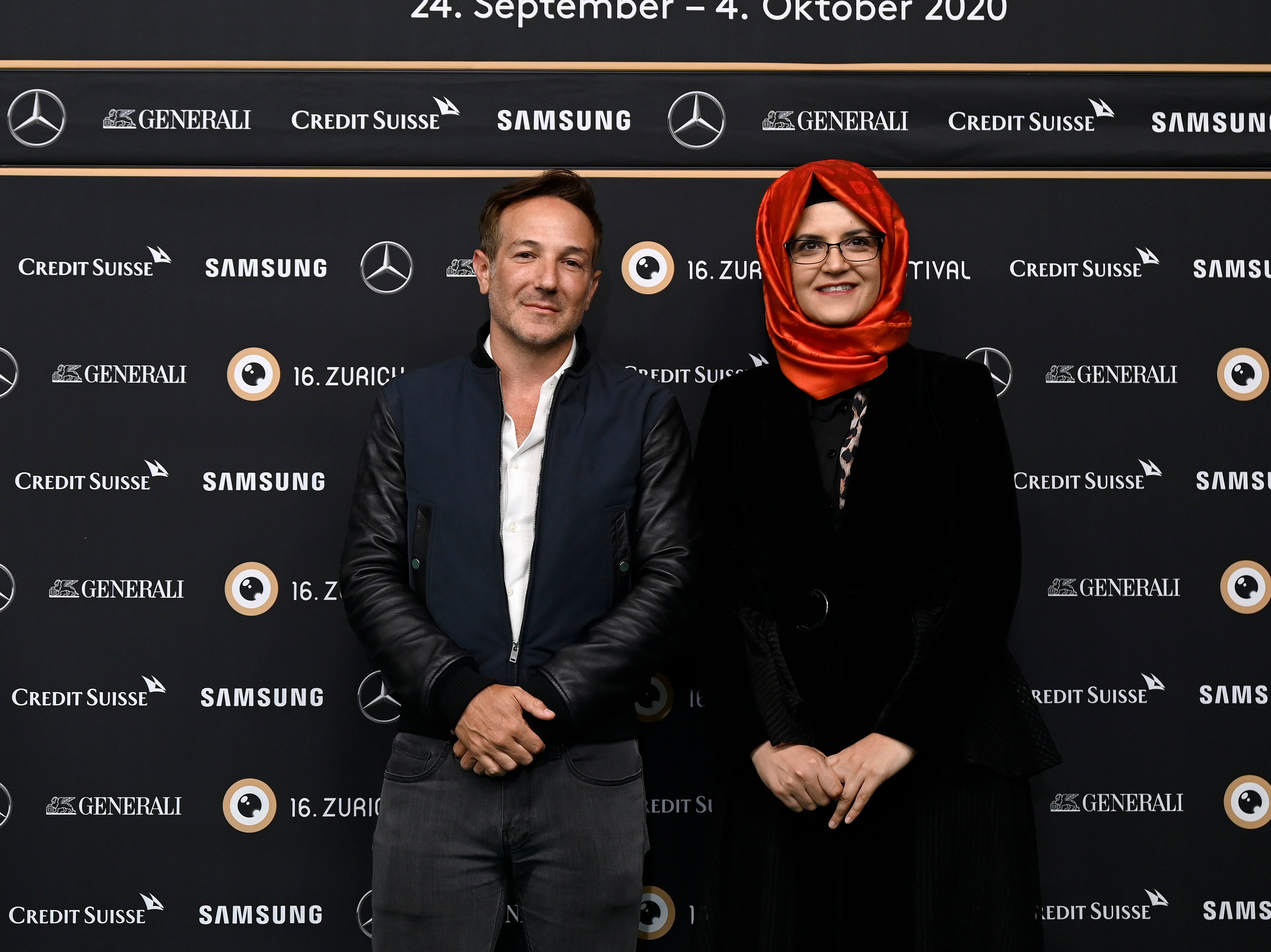 Director Bryan Fogel and Hatice Cengiz attend the ‘The Dissident’ photo-call at the 16th Zurich Film Festival