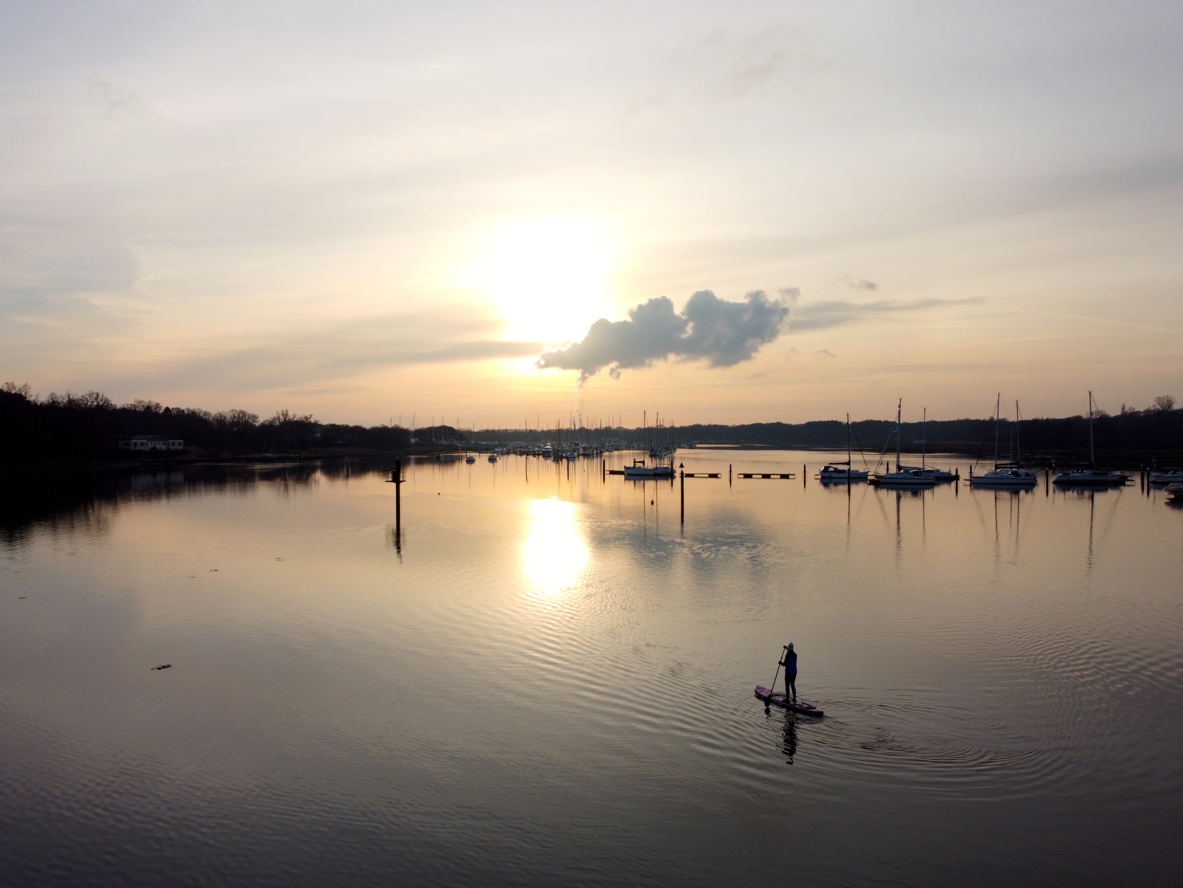 Paddleboarding into the sunset