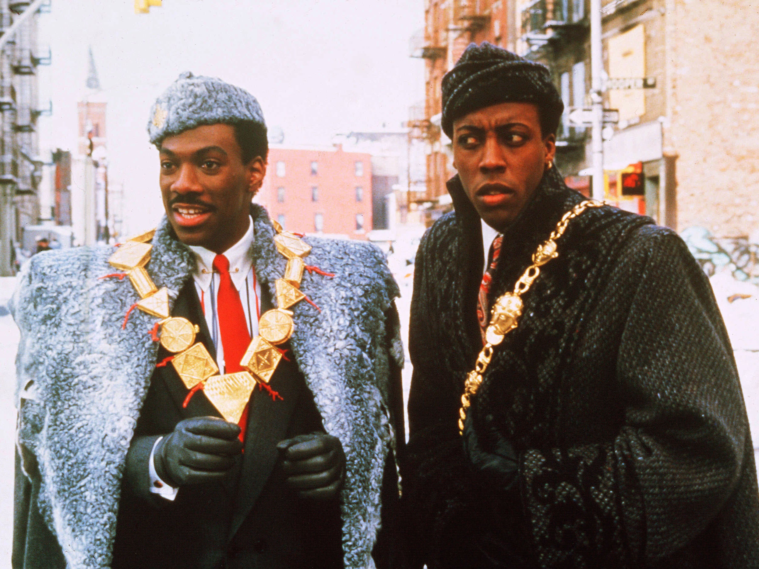 Murphy and Hall in Coming to America, released in 1988