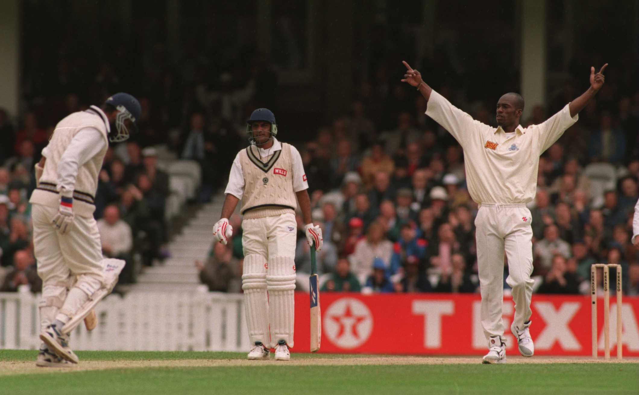 Lewis celebrates taking a wicket at the Oval