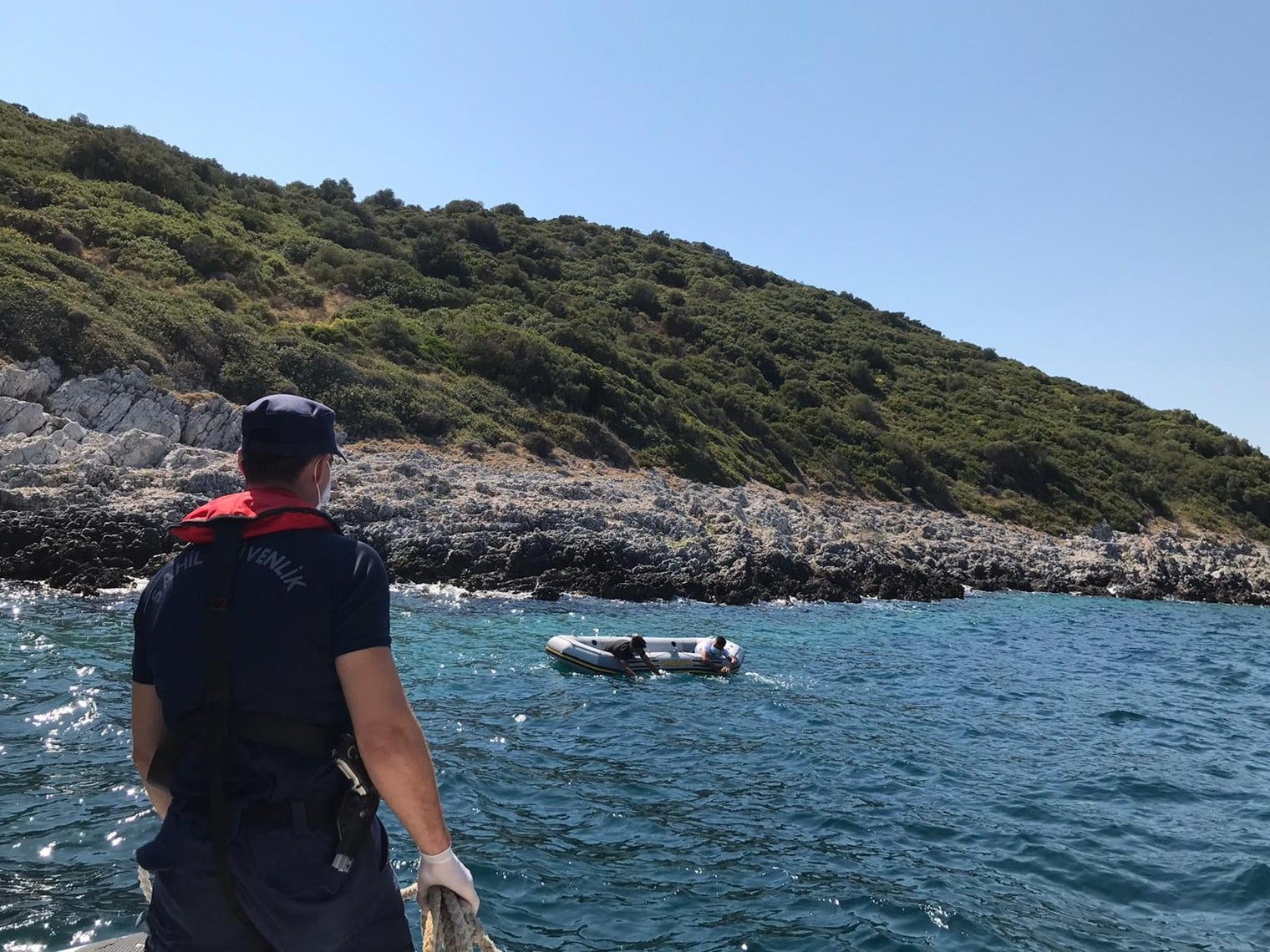 Two boys, aged 16 and 15, are found adrift in the sea off the coast of Turkey after allegedly being returned to the water by Greek officials