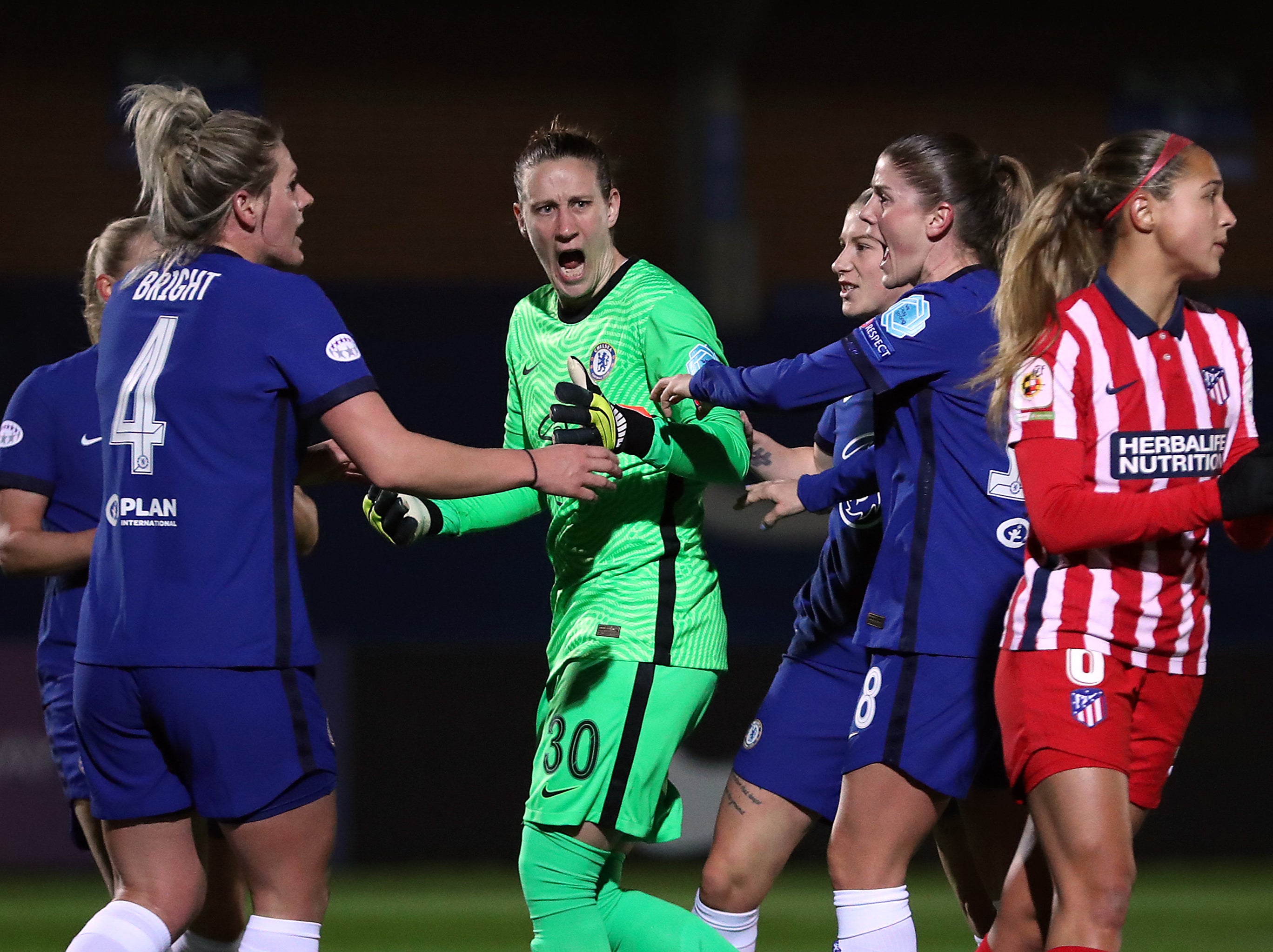 Ann-Katrin Berger celebrates saving a penalty