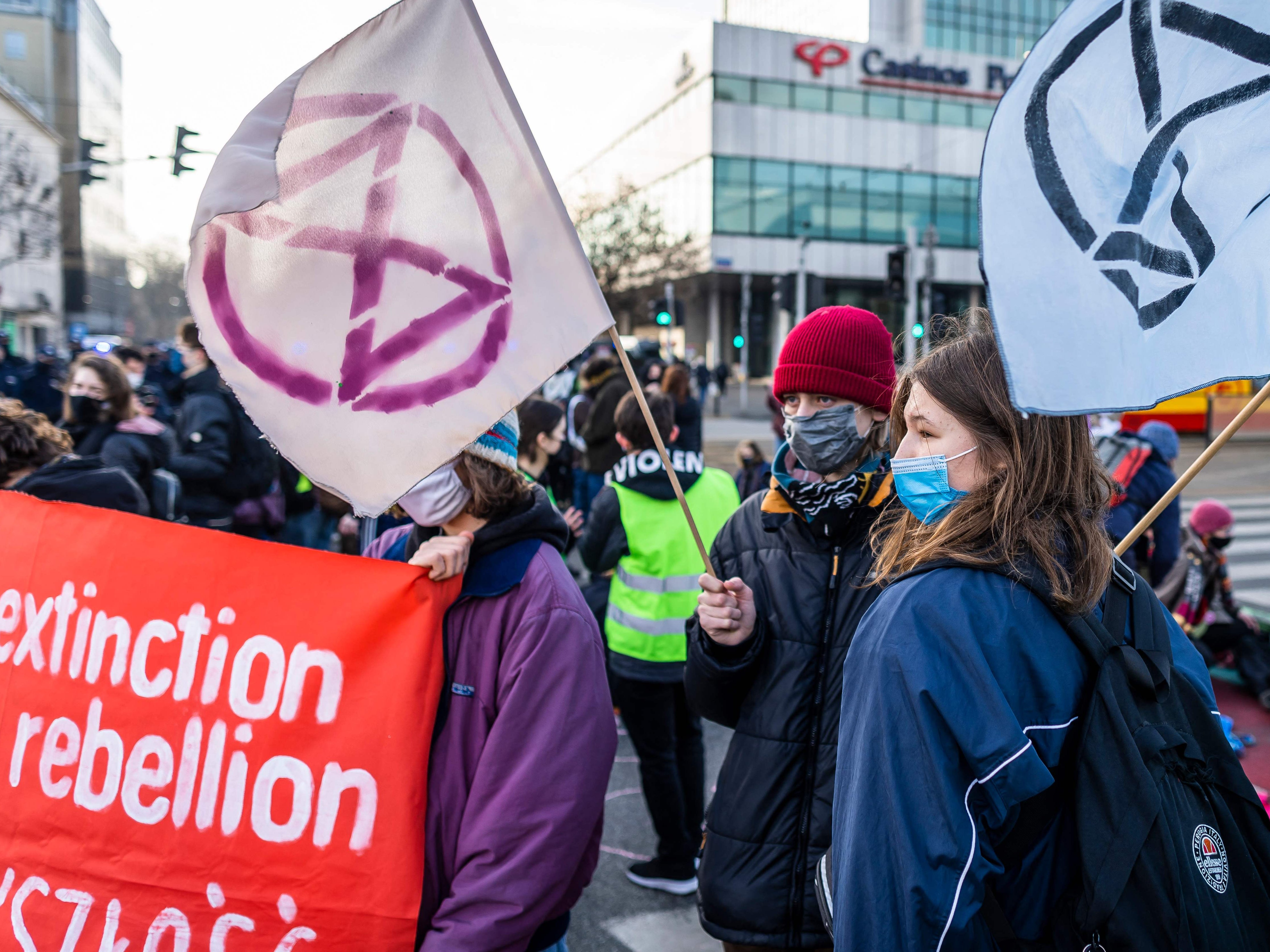 The lone climate activist unfurled a banner reading “Climate Assembly, be bold” as part of a call for a more radical approach from Scotland’s Climate Assembly on Thursday morning