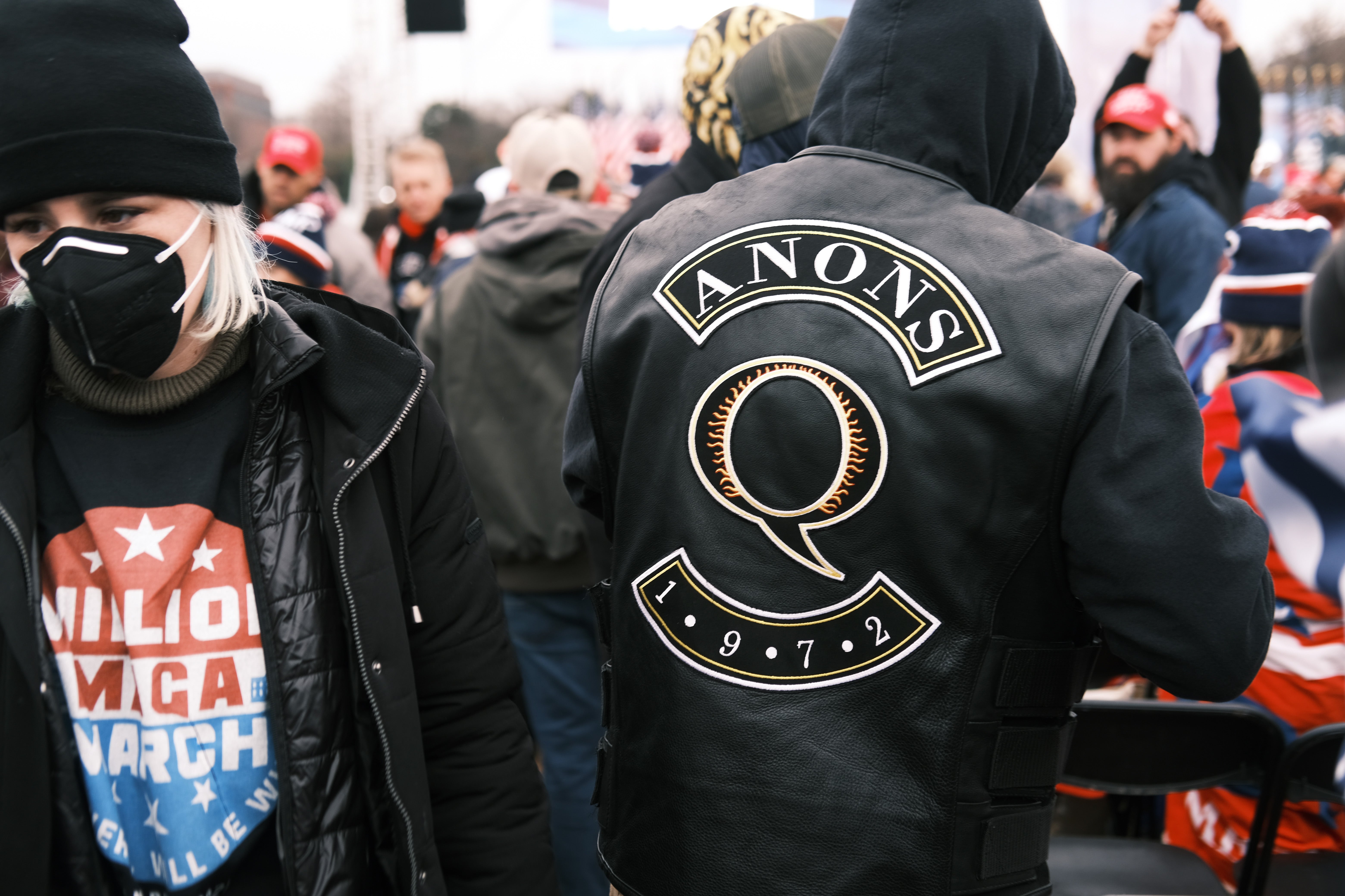 QAnon is spreading damaging conspiracy theories targeting Chinese and Jewish people, experts say. File photo.