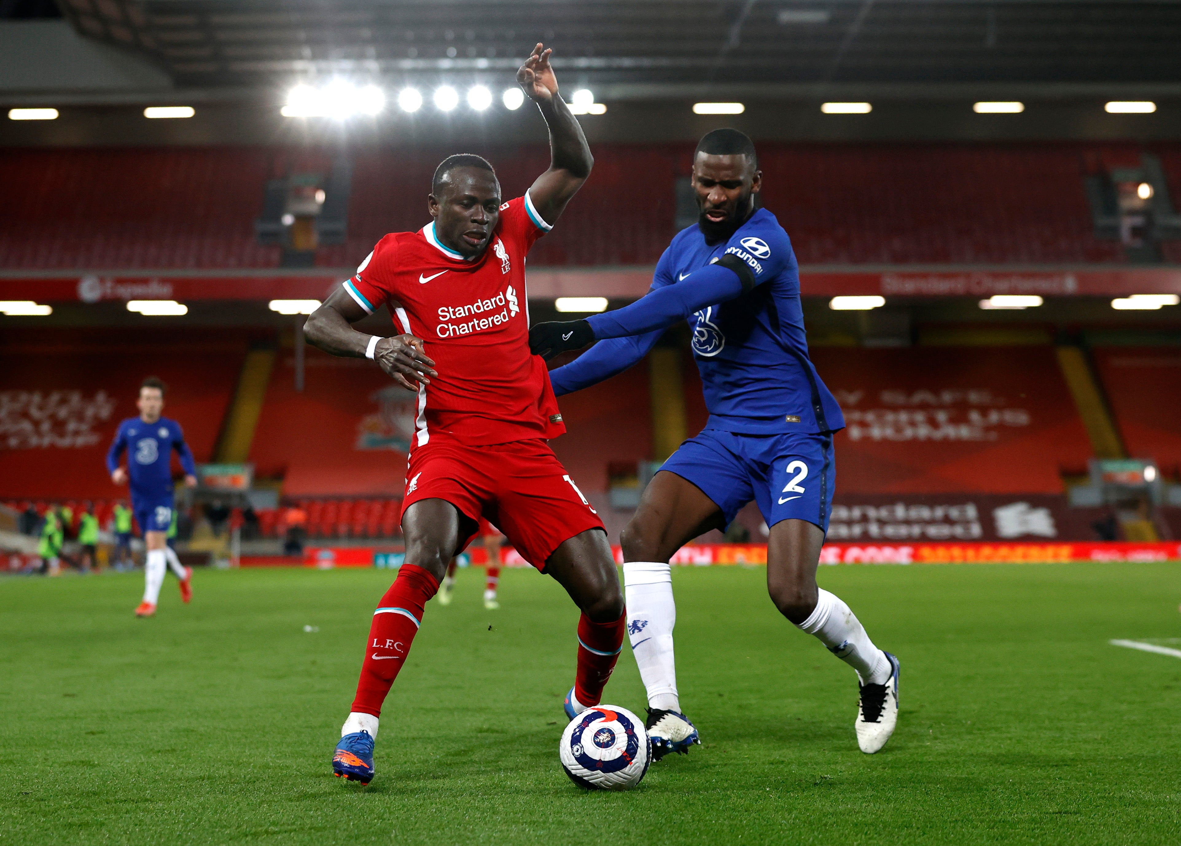 Sadio Mane battles for possession with Antonio Rudiger