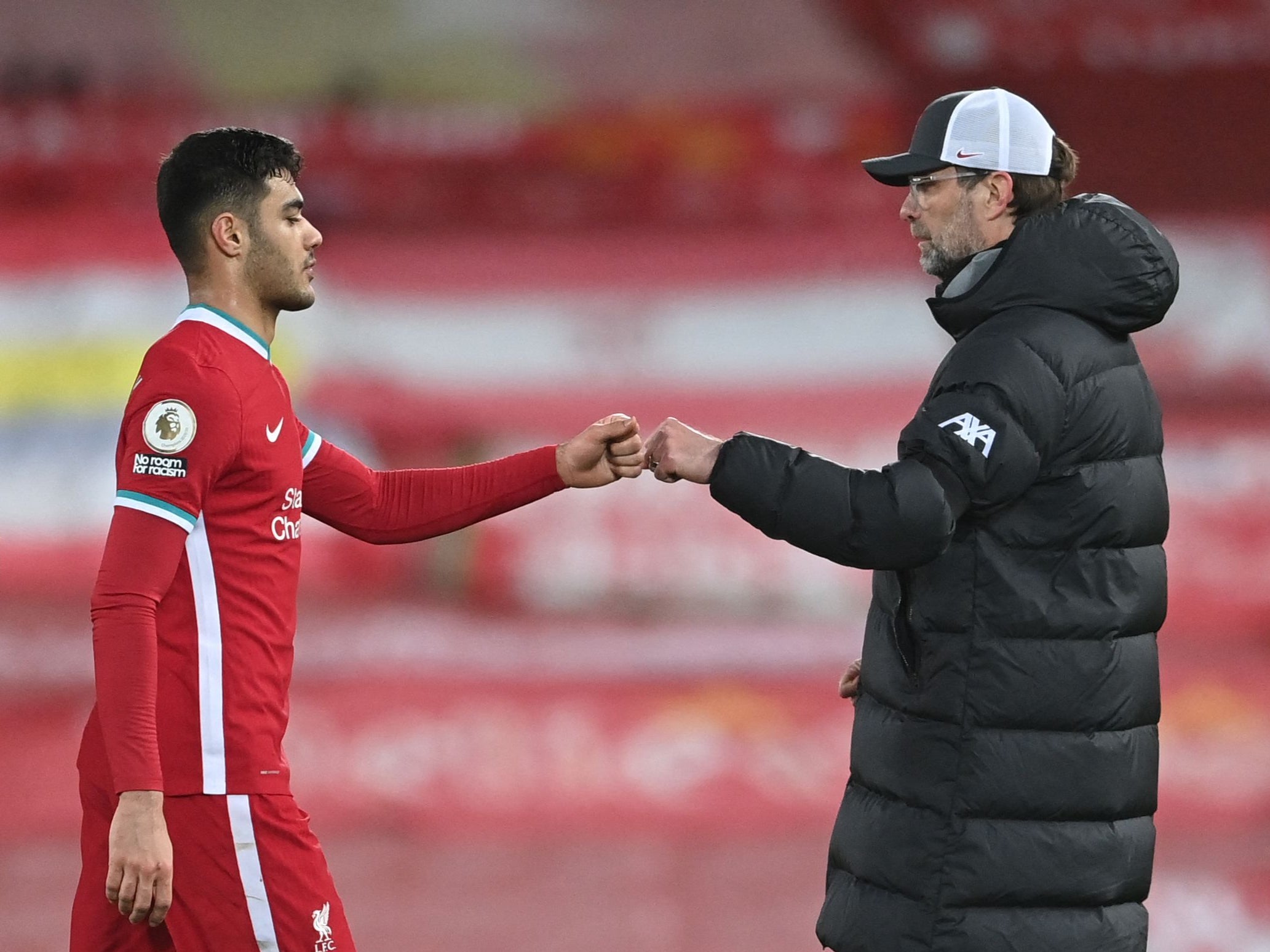 Liverpool manager Jurgen Klopp and defender Ozan Kabak