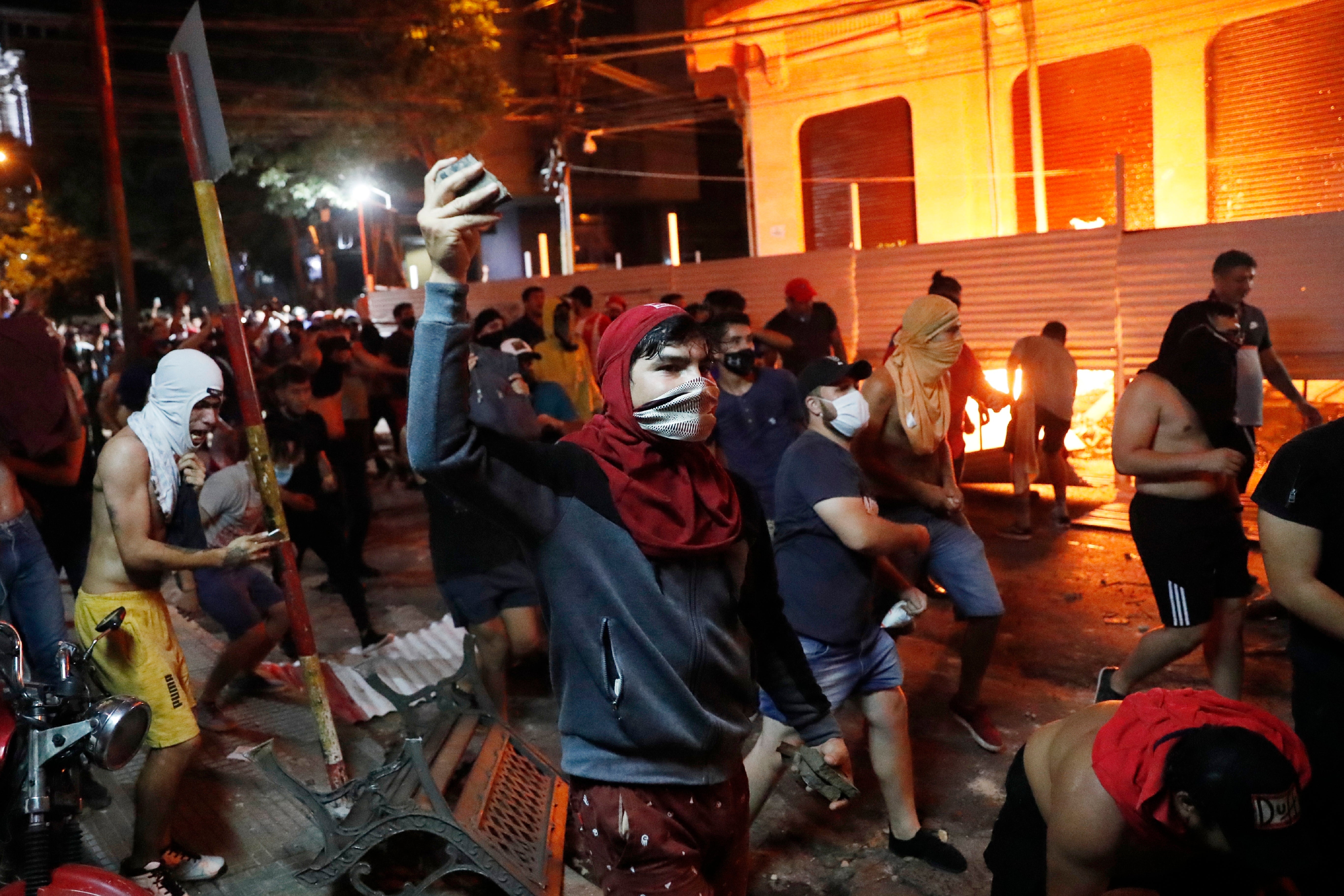 Some rioters threw rocks at police