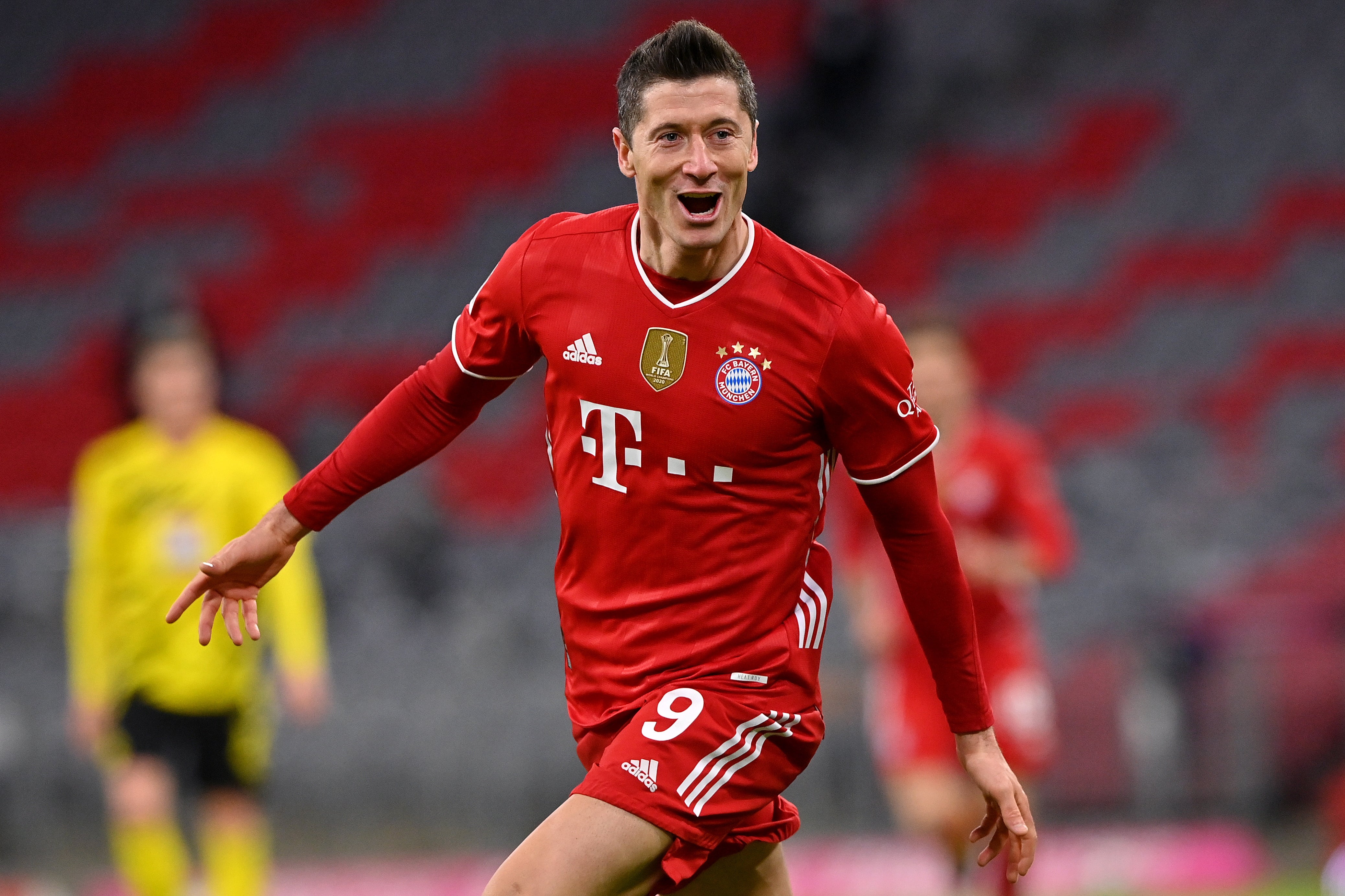 Robert Lewandowski celebrates after sealing his hat-trick