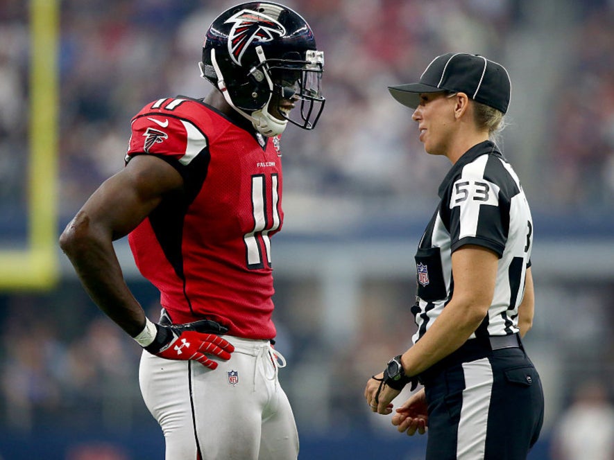 Sarah Thomas speaks to Julio Jones of the Atlanta Falcons in 2015