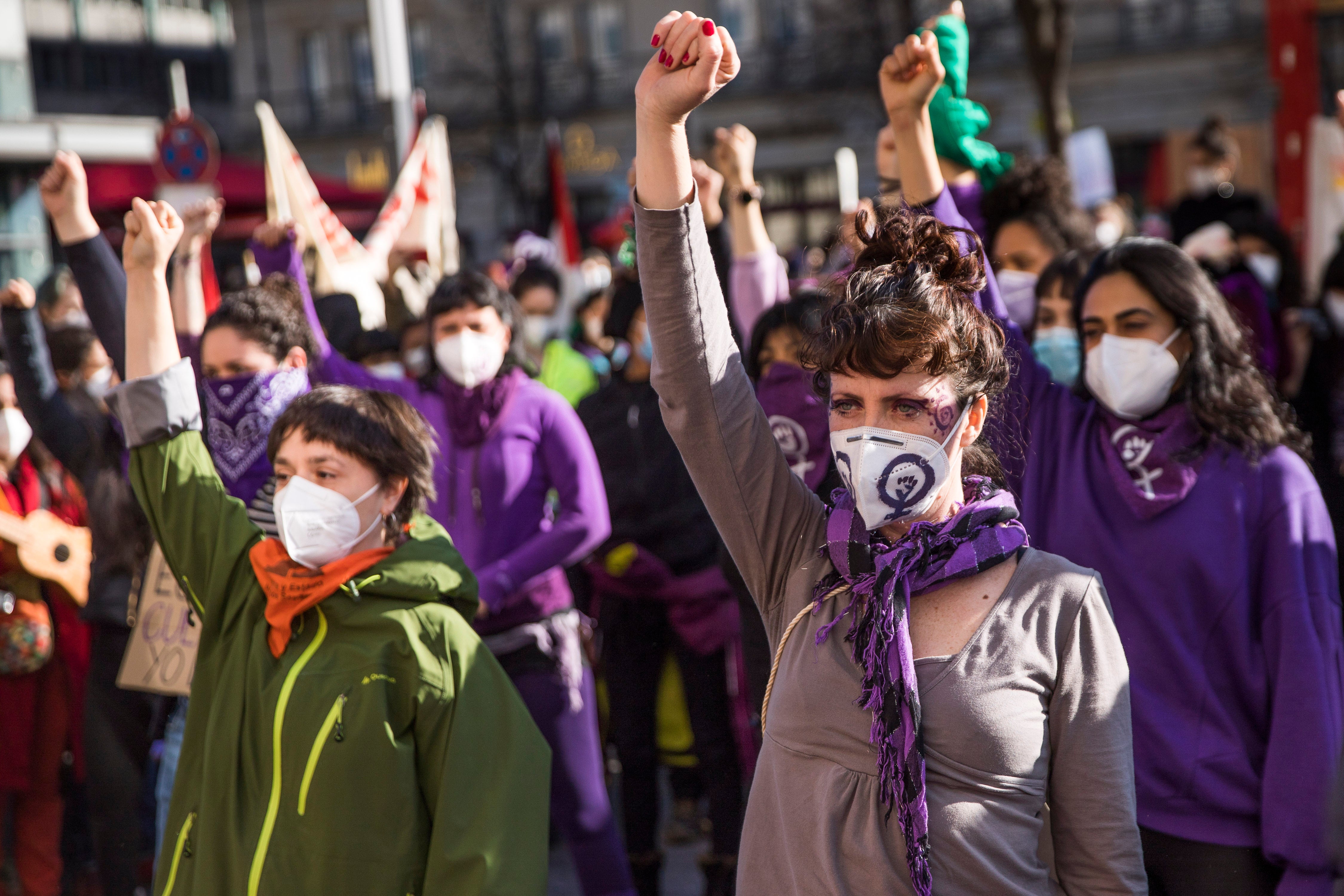 Protesters assemble at a rally organised near Brandenburger in Berlin