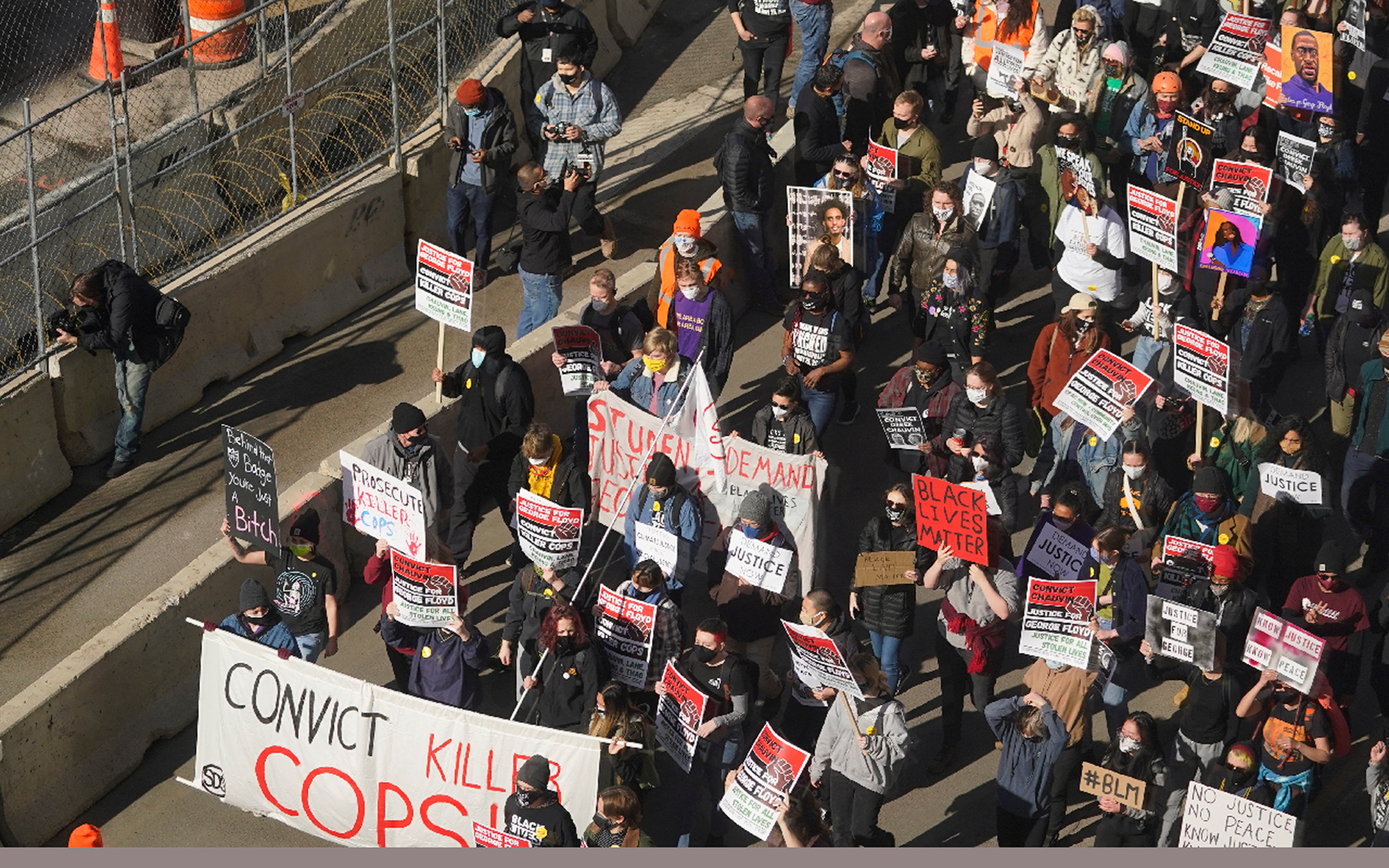 Hundreds of demonstrators march through Minneapolis following protests near the Hennepin County Government Center on 8 March 2021, in Minneapolis where the trial for former Minneapolis police officer Derek Chauvin began with jury selection.