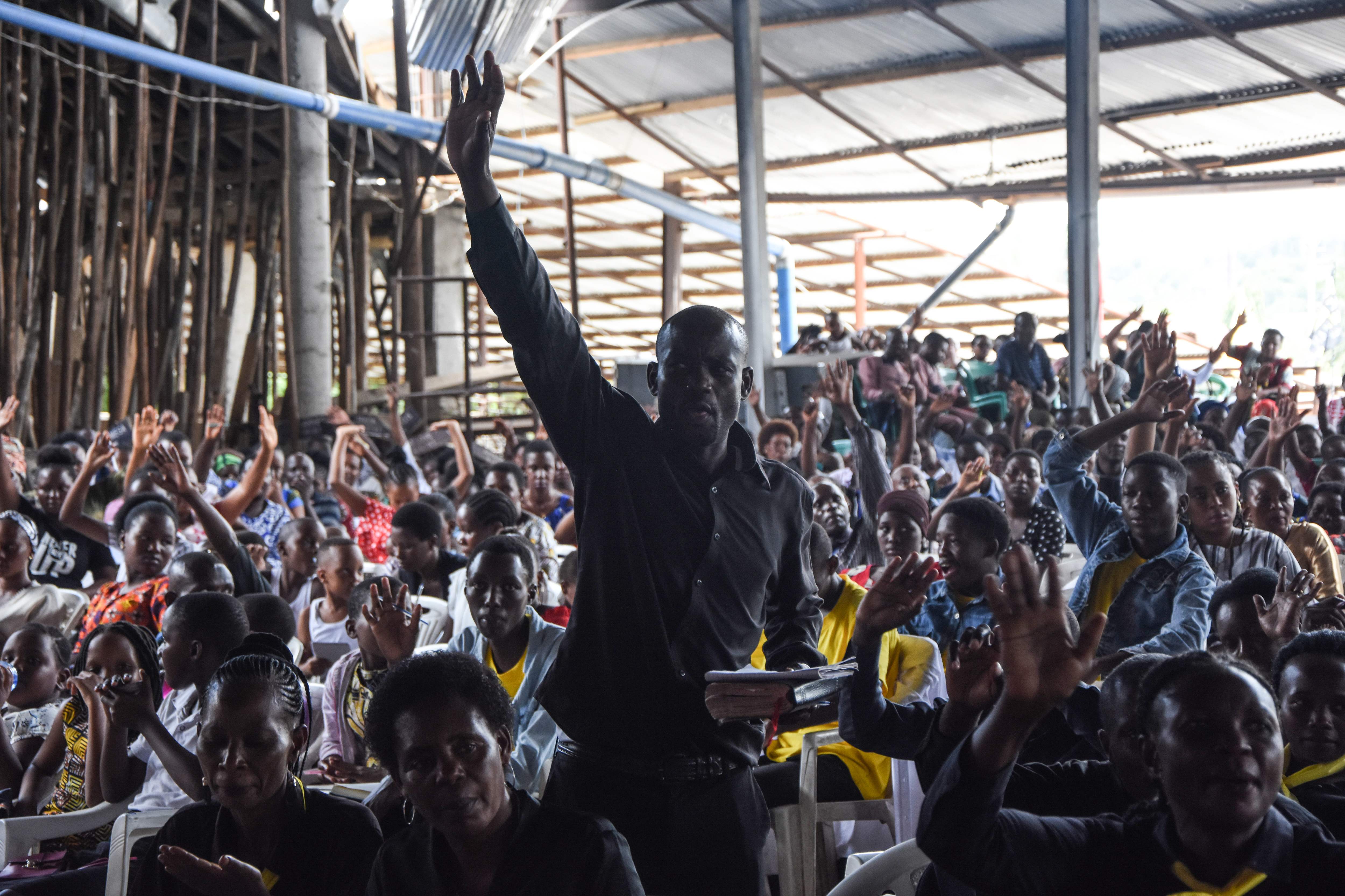 Believers attend the Sunday mass without wearing masks and social distancing at Ufufuo na Uzima Church