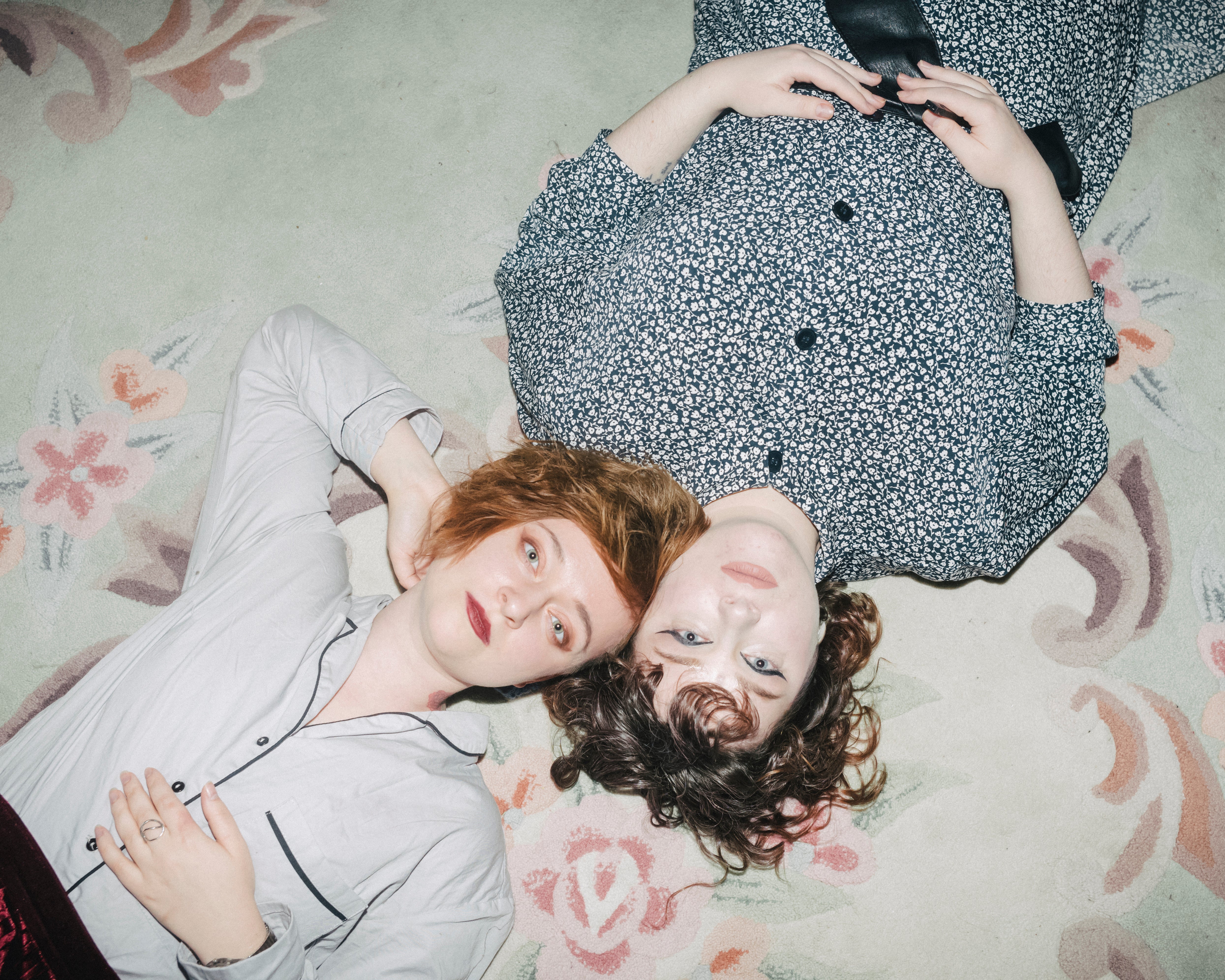 Daria Serenko, left, and Sonia Sno in the room where they sleep and work at Femdacha