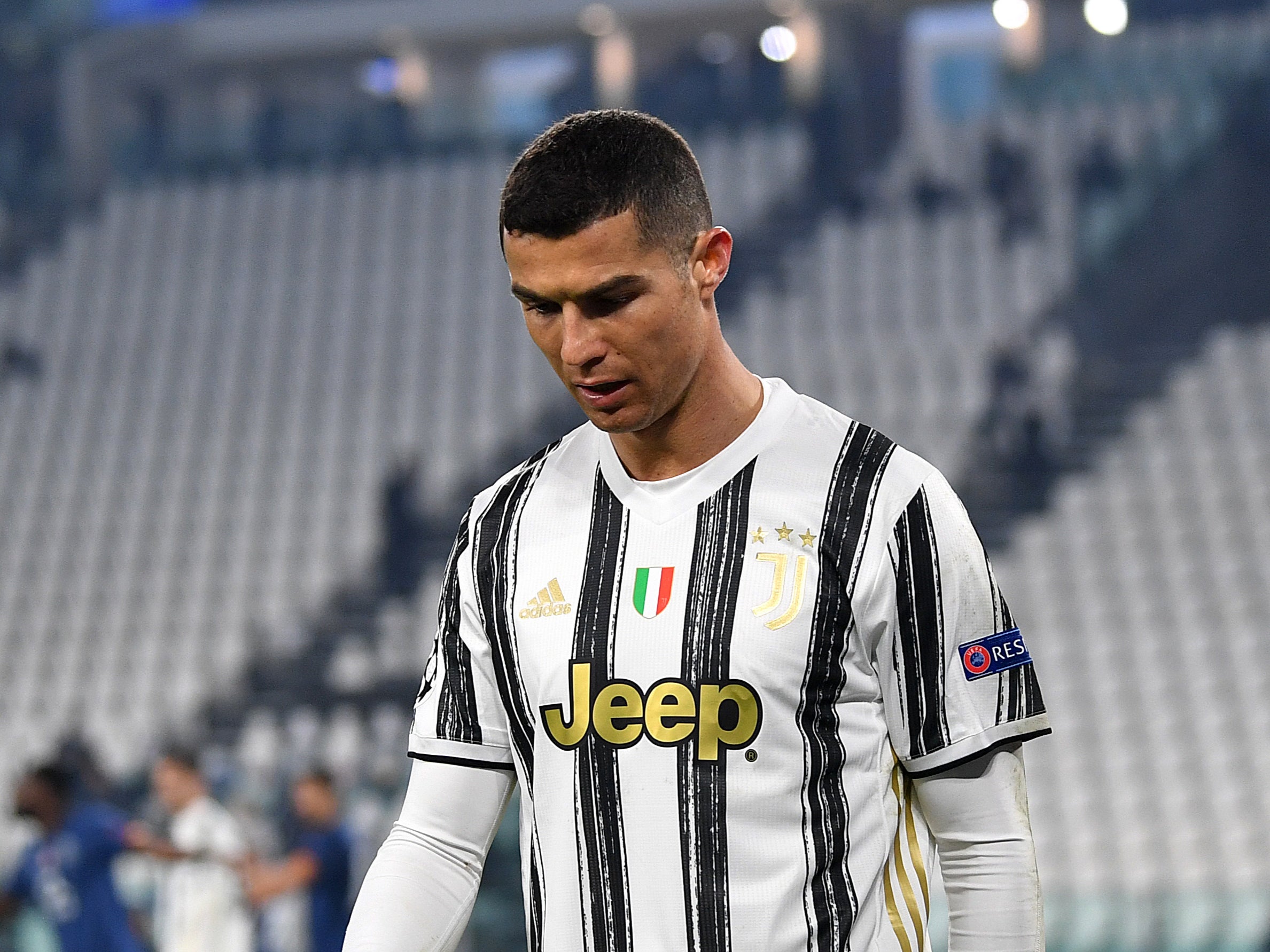 Cristiano Ronaldo looks dejected after Juventus suffer elimination in the Champions League