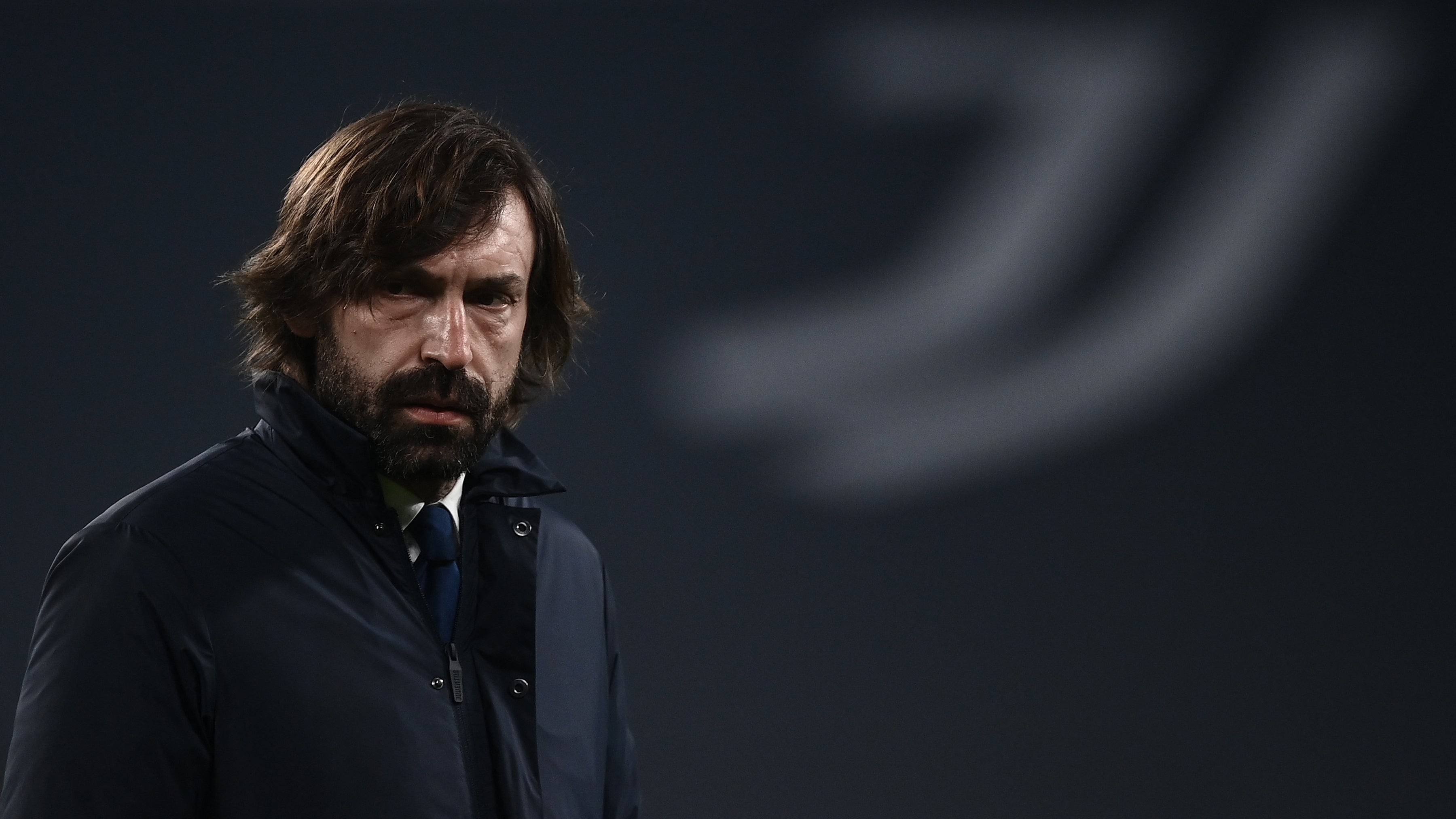 Andrea Pirlo looks on after defeat to Porto