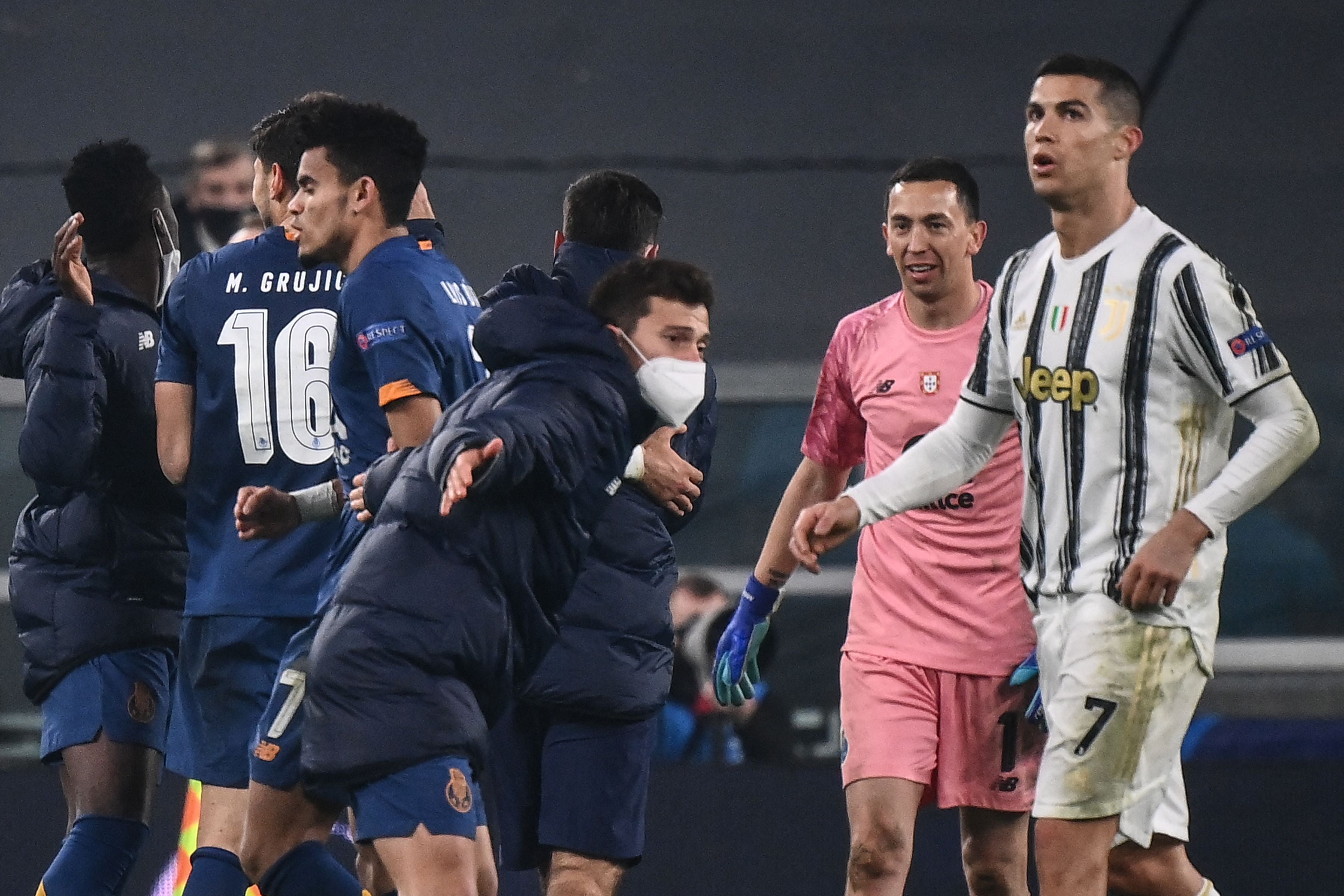 Cristiano Ronaldo looks on as Porto celebrate