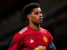 Marcus Rashford handed out cash to children and homeless in Manchester