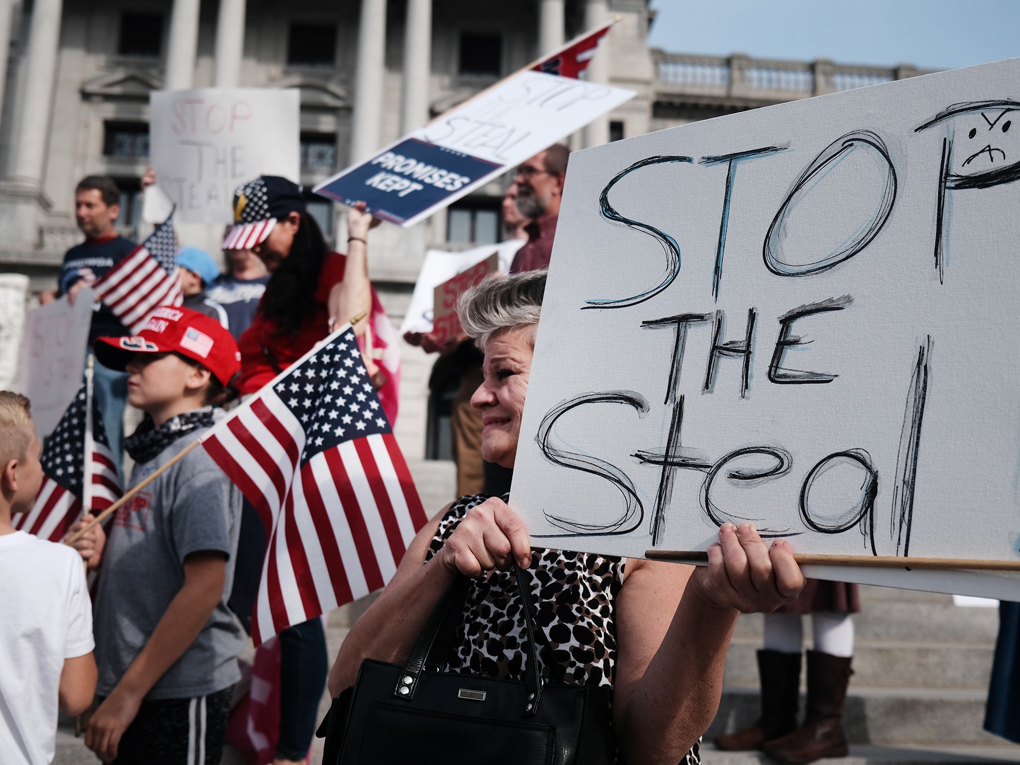 Pro-Trump supporters demand voting stops during last year’s election