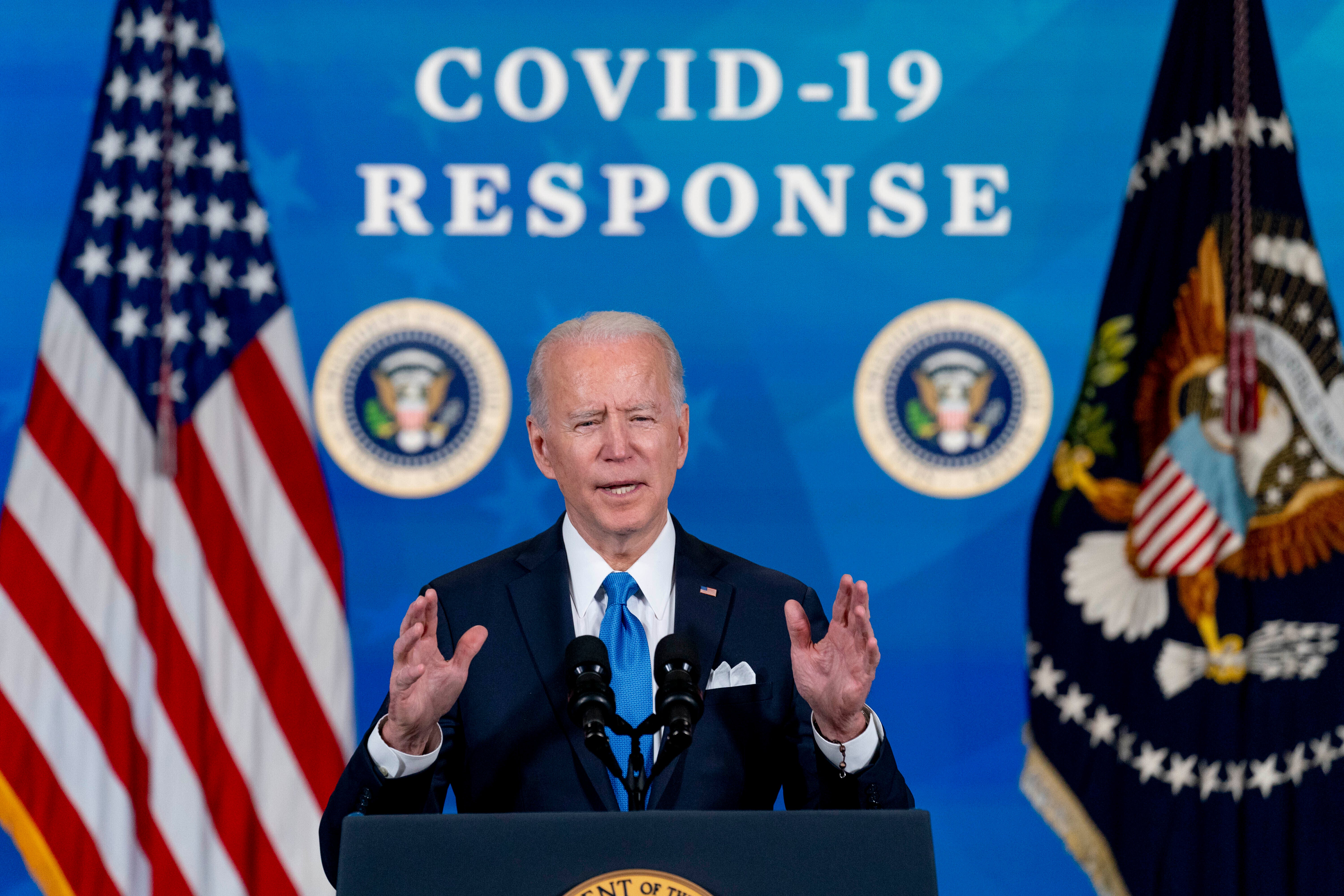 Virus Outbreak One Year Biden