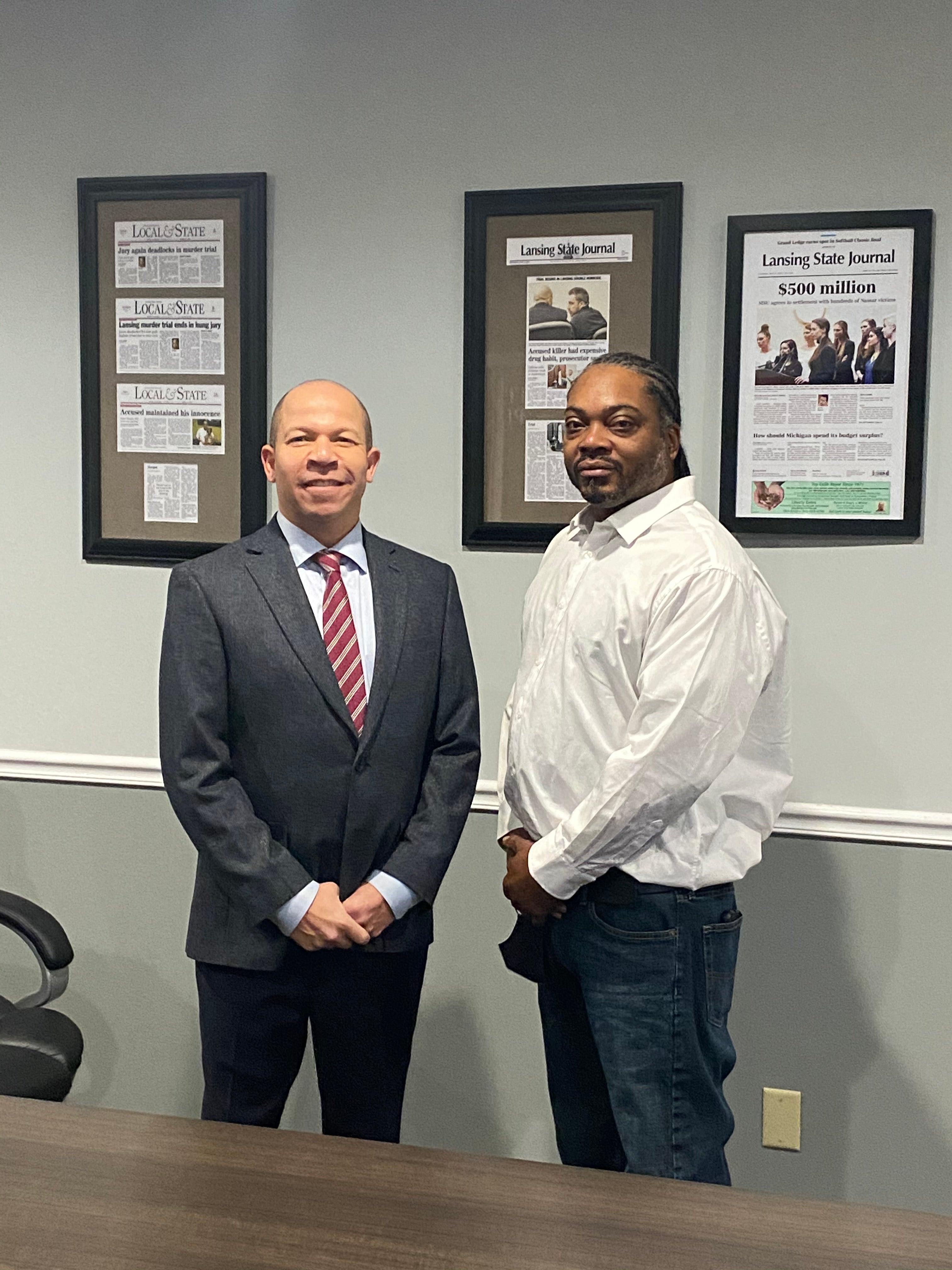 Herbert Alford, 47, (right), pictured with attorney Jamie White on the day they learned his murder conviction had been overturned in December 2020