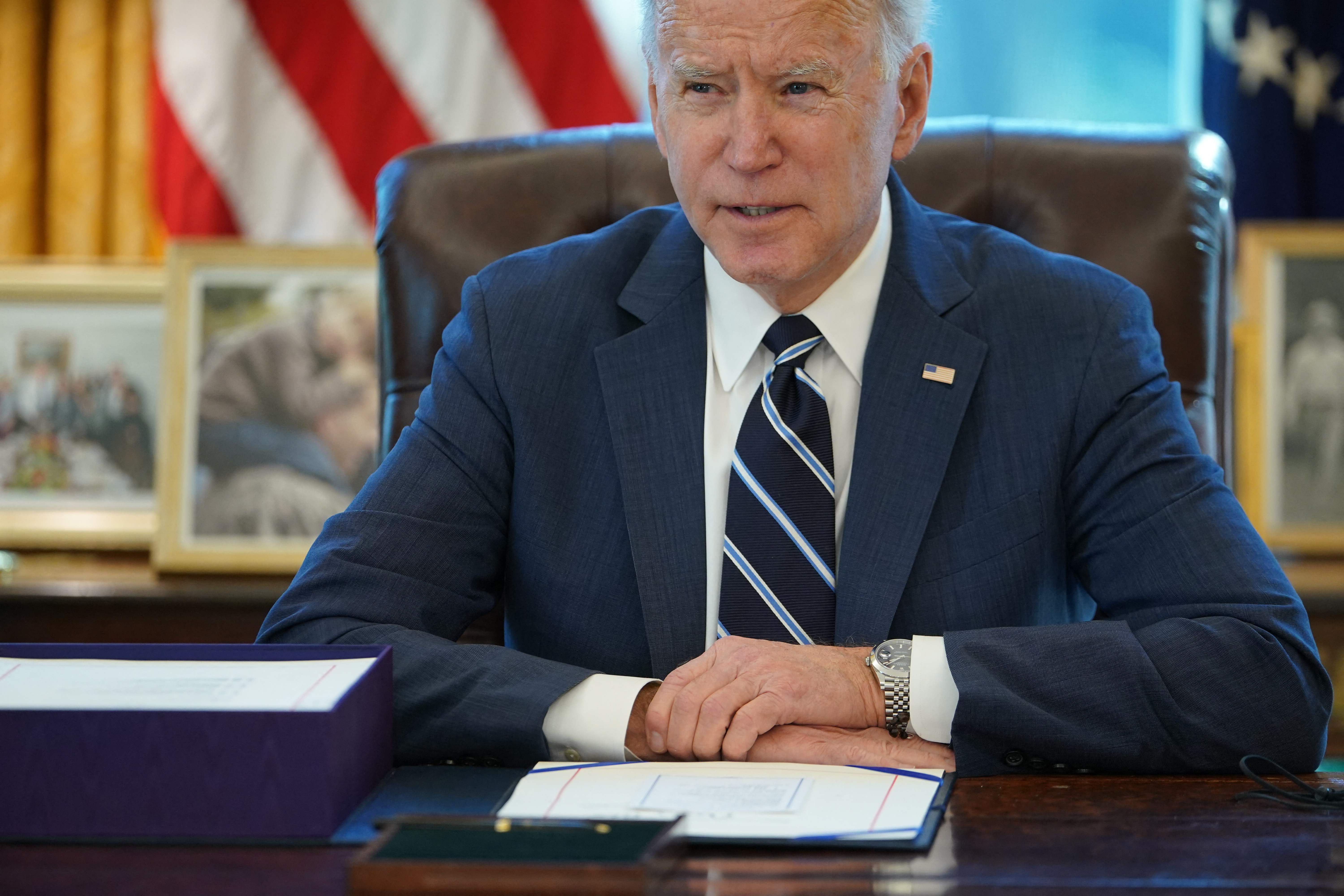 Joe Biden signs $1.9trn Covid package into law in historic bid to slash poverty