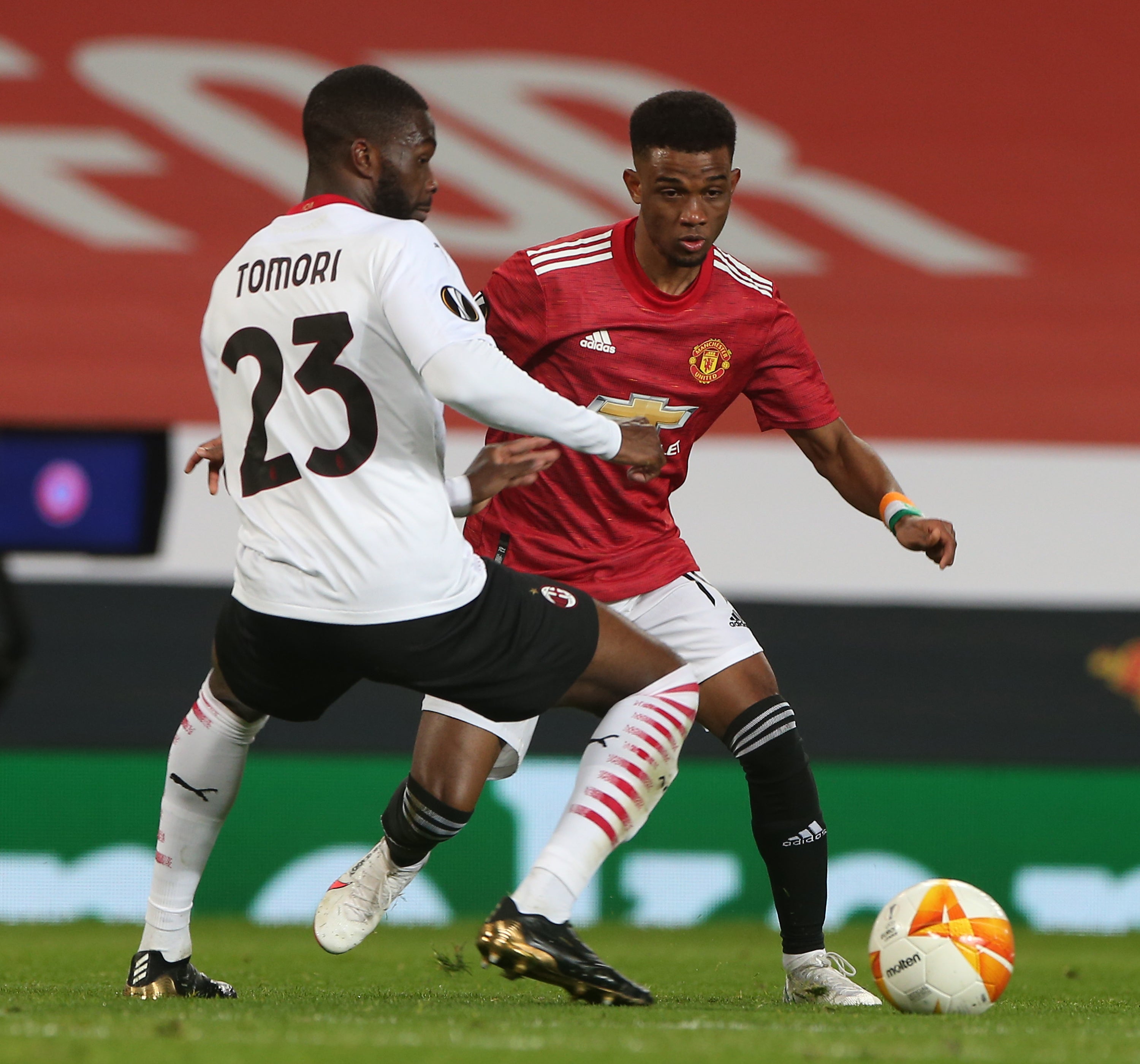 Amad in action with Fikayo Tomori