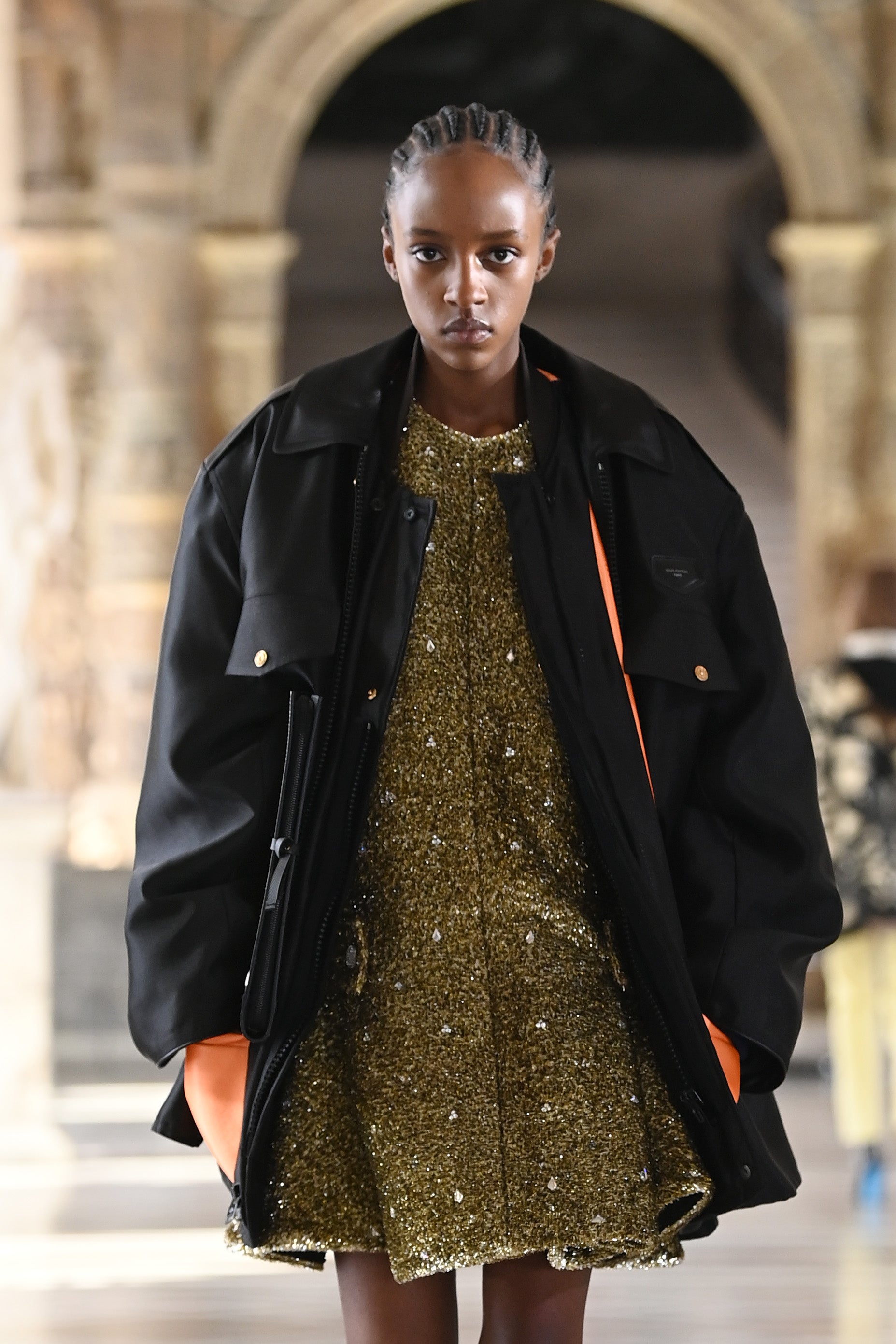 A model walks the runway during the Louis Vuitton show