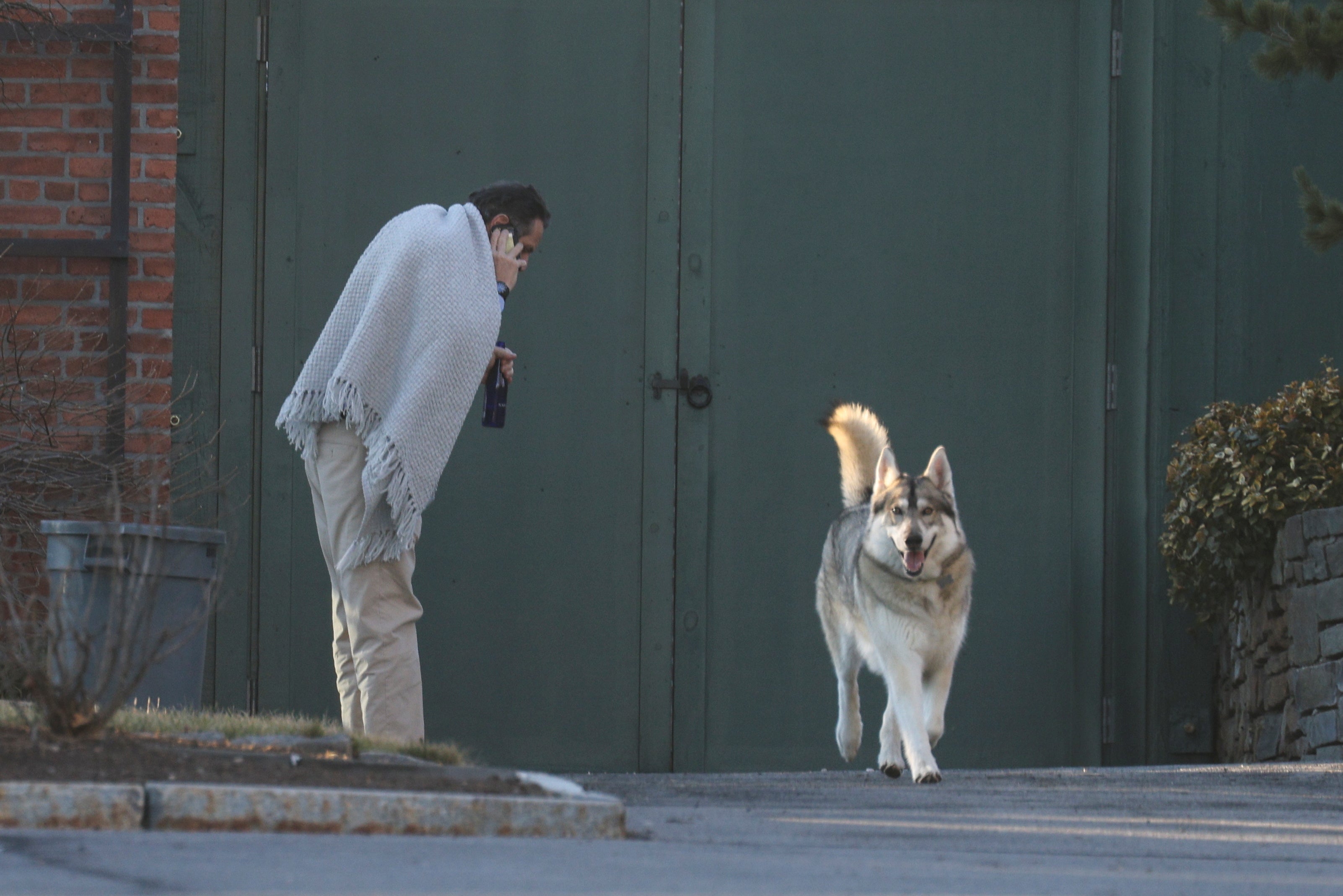 New York Governor, Andrew Cuomo, walks on the grounds of the Governor's Mansion following allegations that he had sexually harassed young women