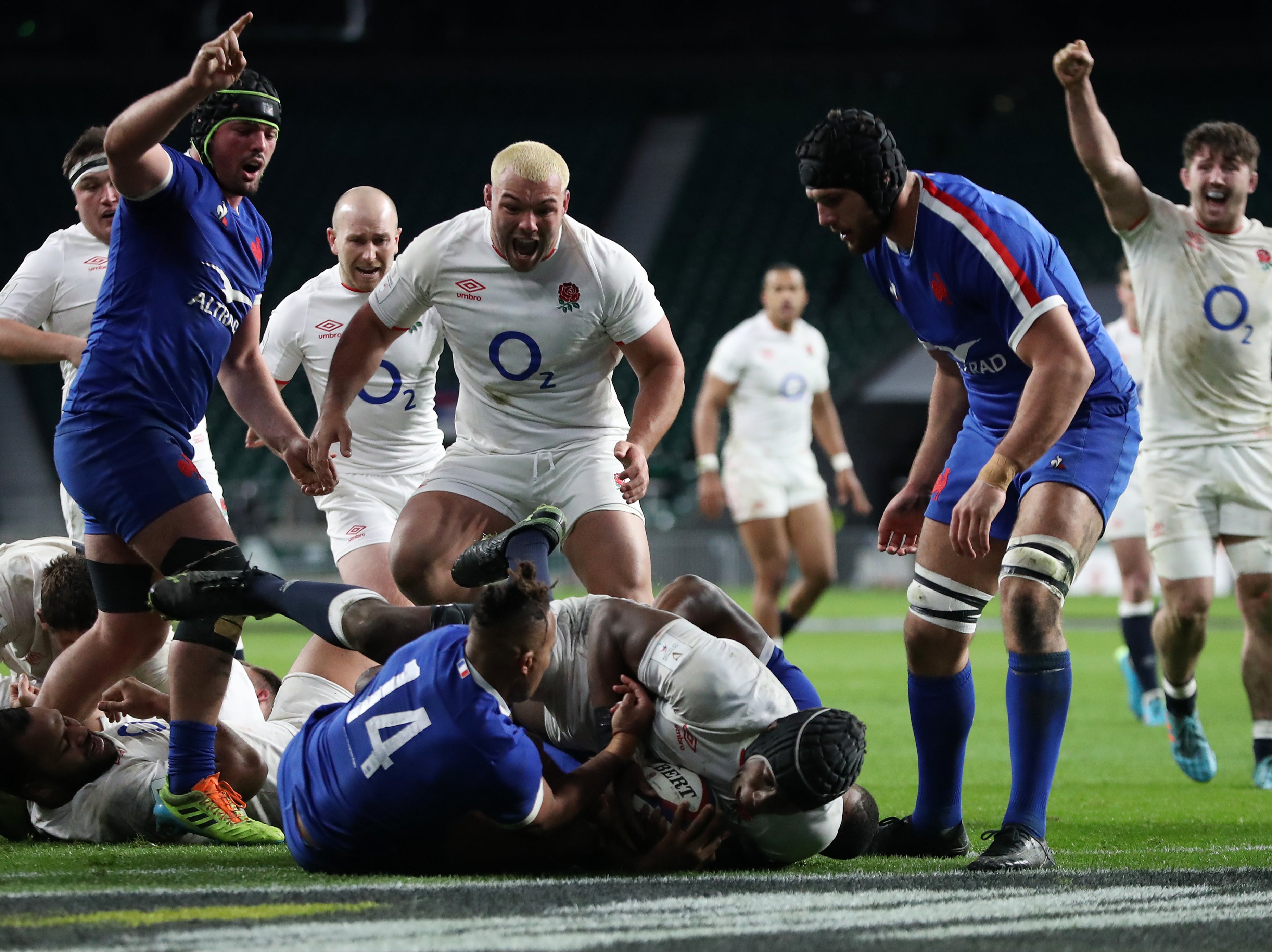 Maro Itoje powers over the line