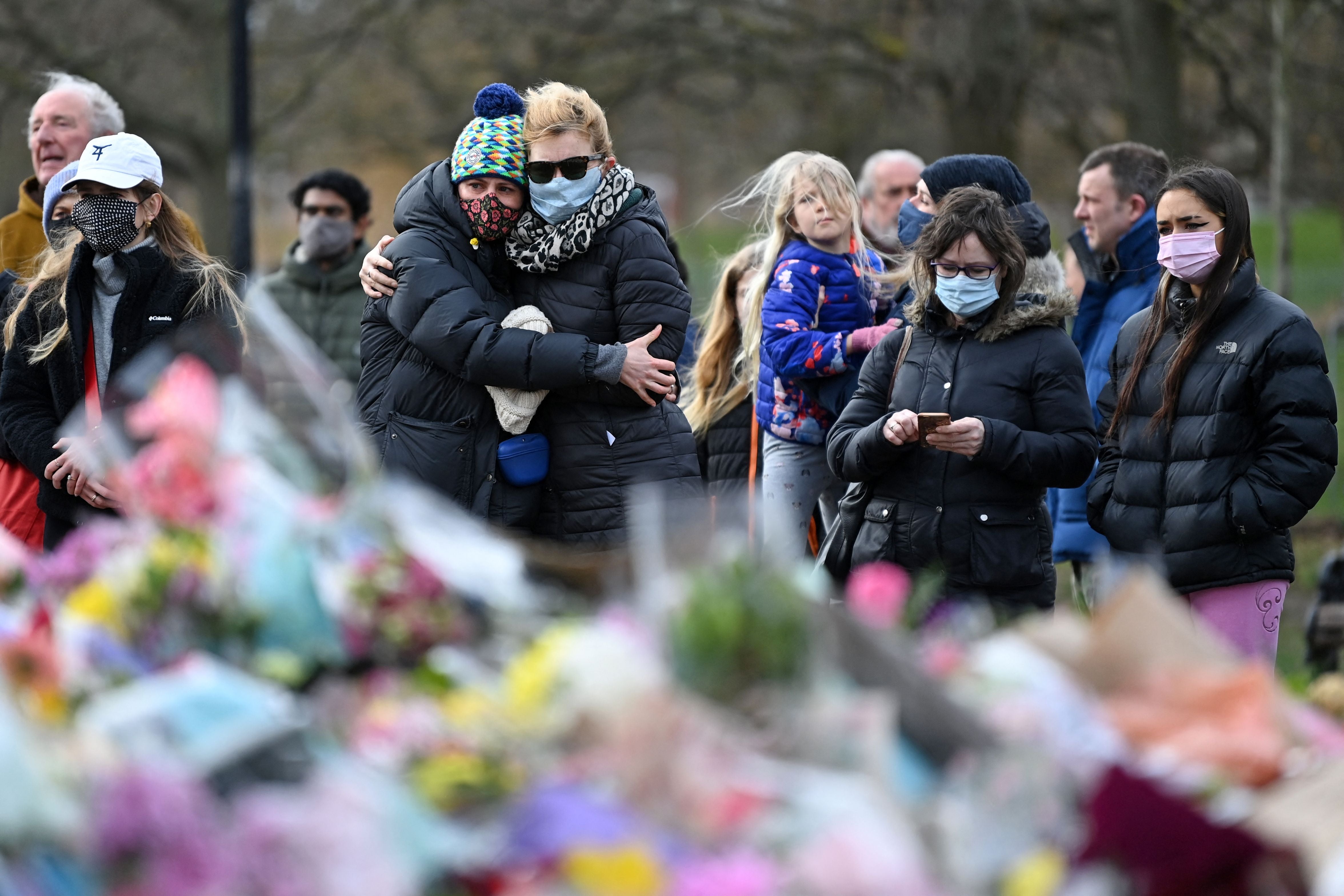 Women and allies gather in Clapham Common on Sunday, 14 March, 2021, to pay their respects to Sarah Everard.