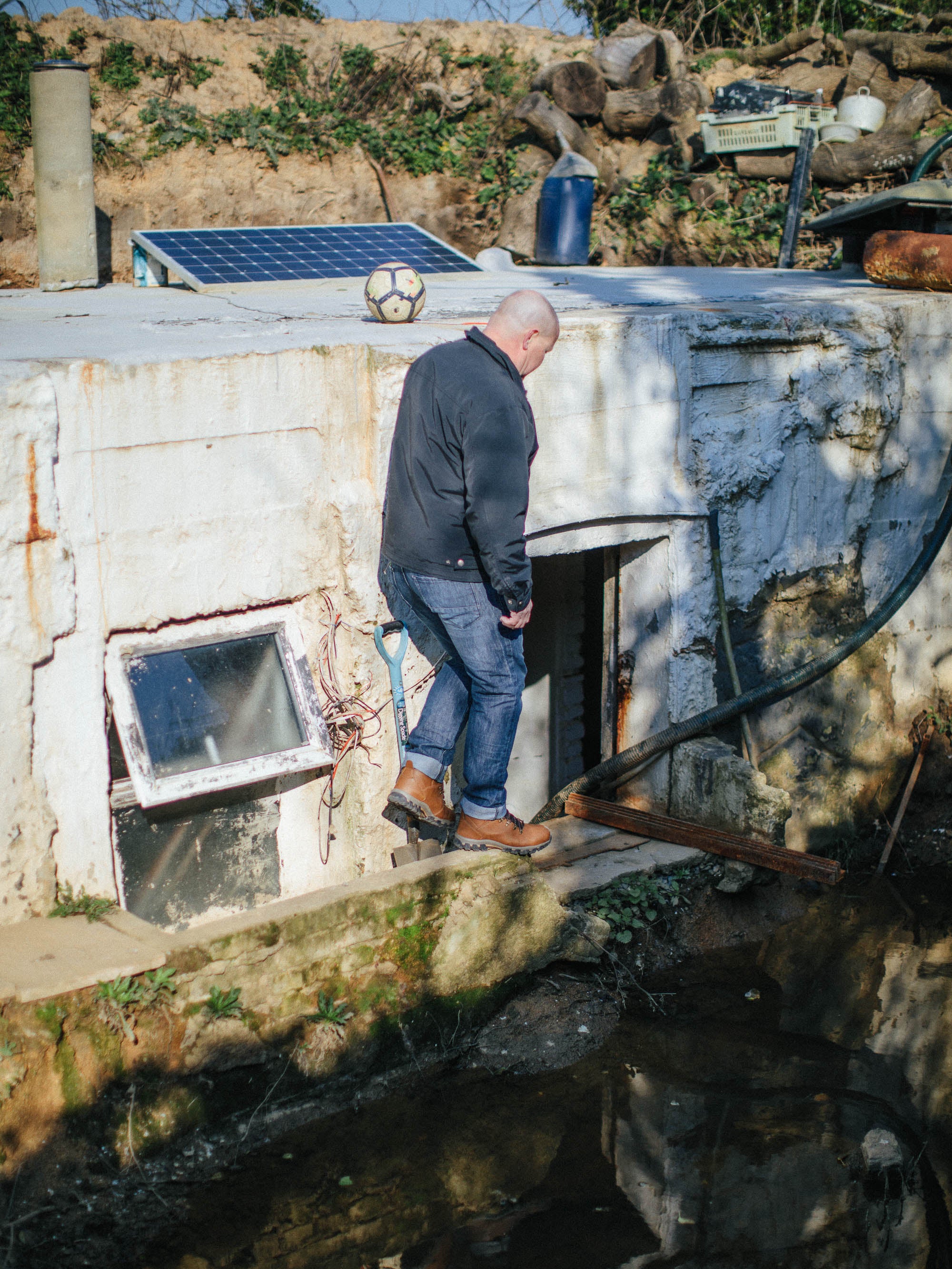 Mr Ogier standing on one of the Second World War bunkers that remain on his land