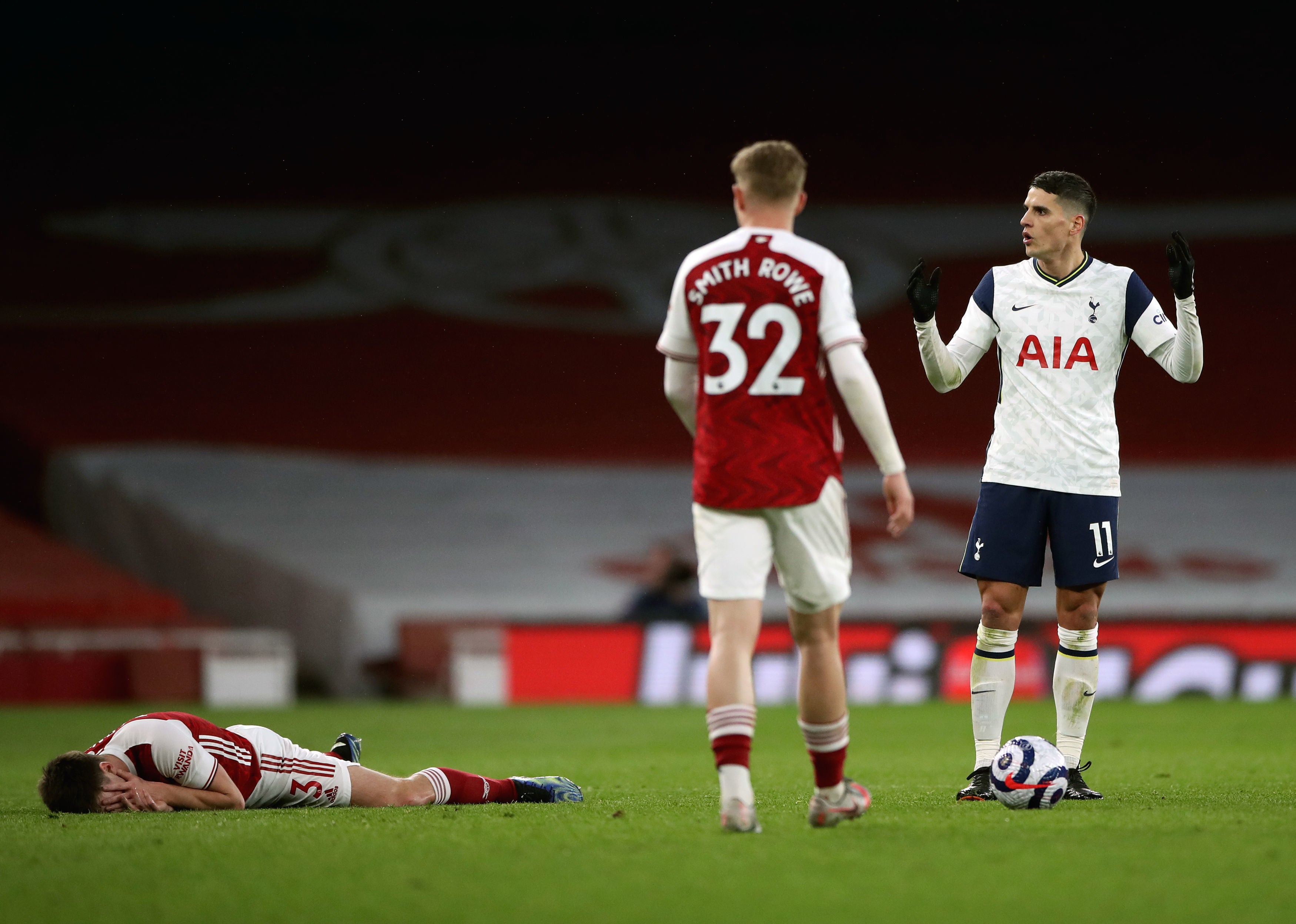 Erik Lamela pleads his innocence after clashing with Kieran Tierney