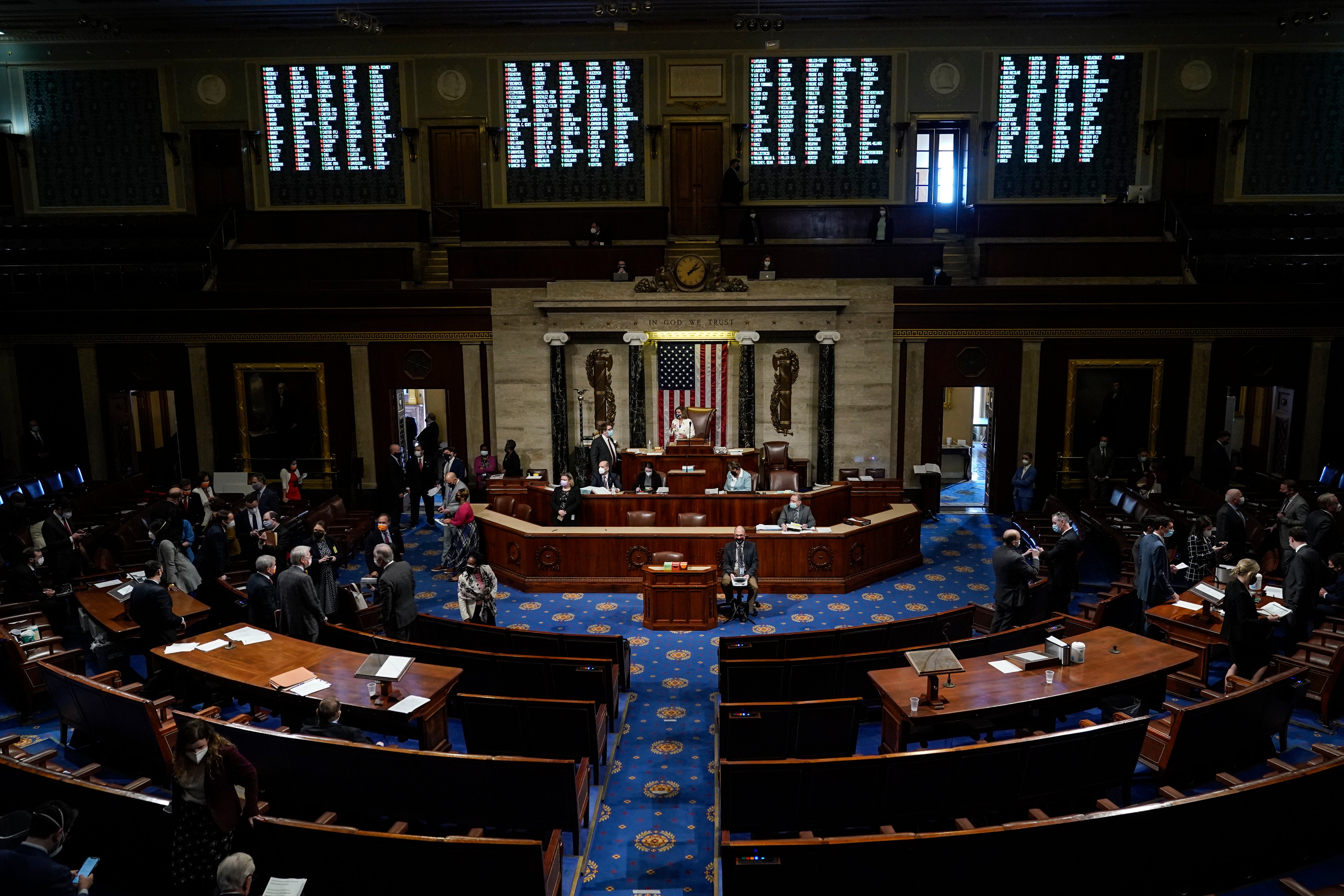 Speaker of the House Nancy Pelosi presides over voting on coronavirus relief package in the House Chamber of the U.S. Capitol on March 10, 2021 in Washington, DC.