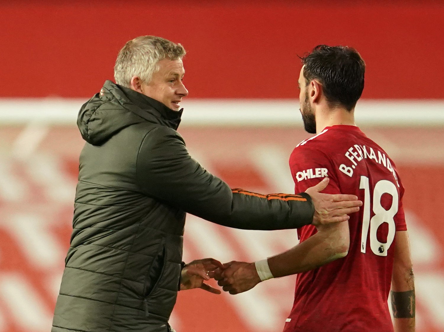 Man United coach Ole Gunnar Solskjaer with midfielder Bruno Ferandes