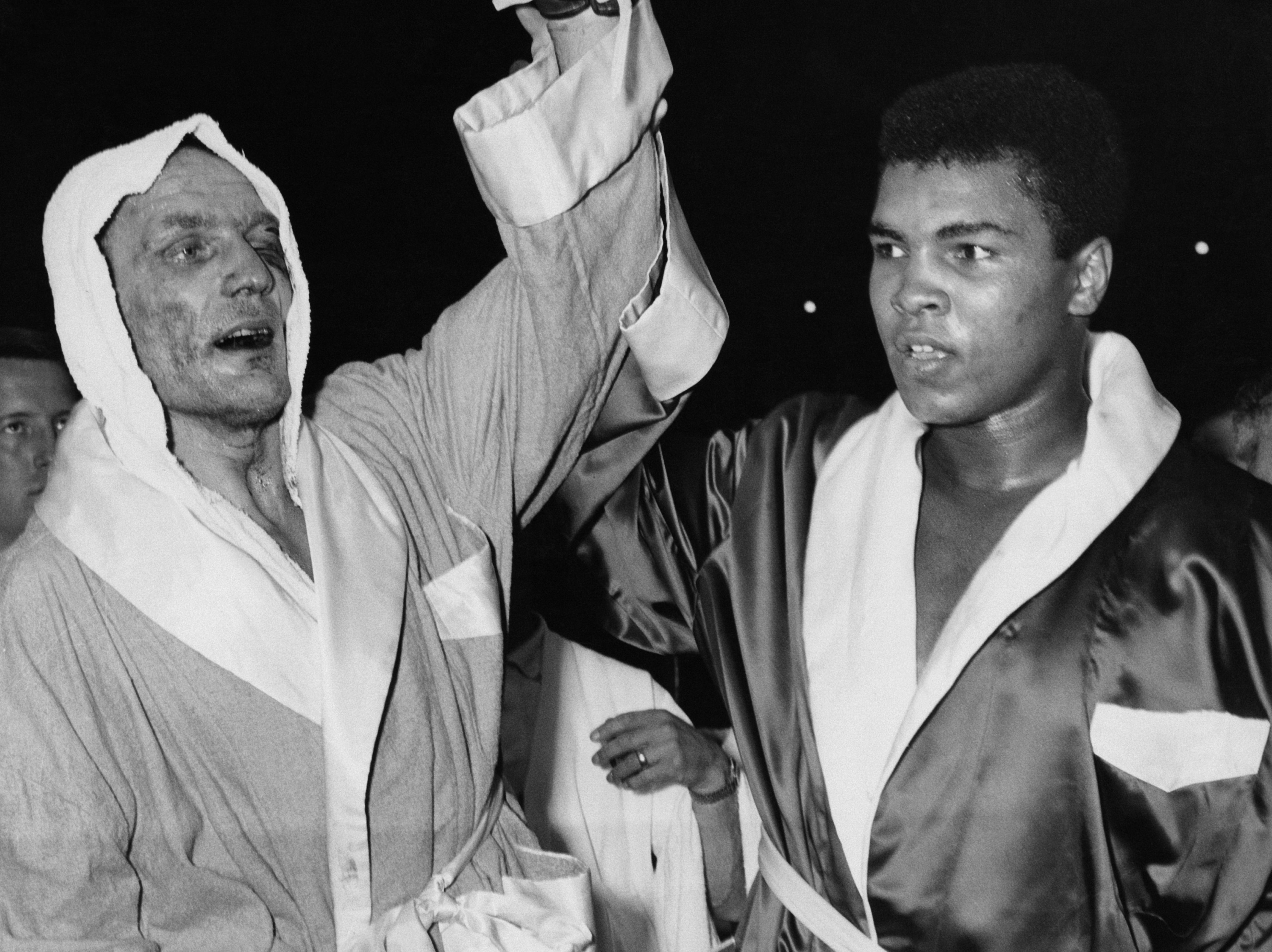 Henry Cooper and Muhammad Ali after their non-title fight in 1963