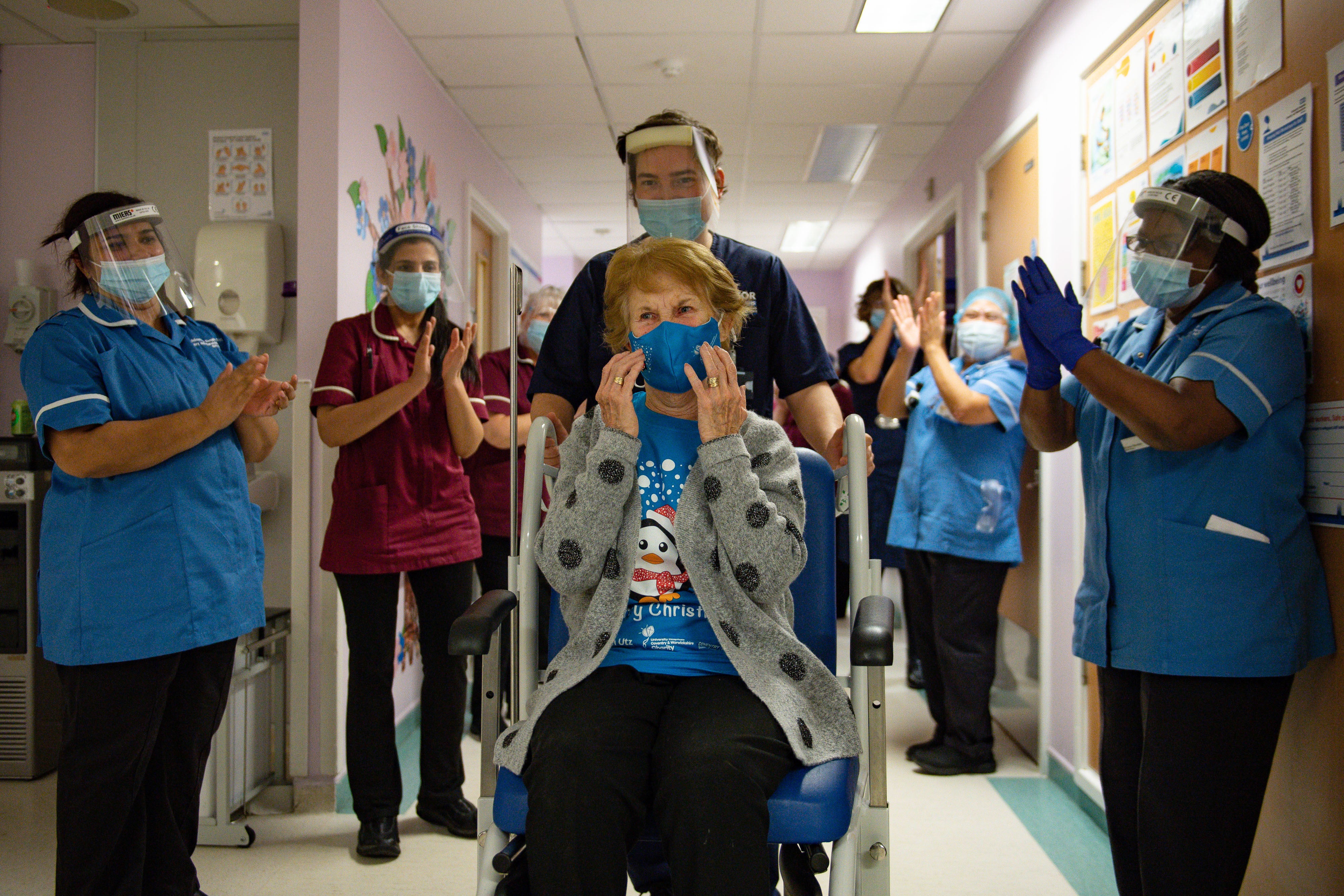 On 8 December 2020, Margaret Keenan, 90, is applauded by staff as she returns to her ward after becoming the first person in the United Kingdom to receive the Pfizer/BioNtech covid-19 vaccine at University Hospital, Coventry, at the start of the largest ever immunisation programme in the UK’s history.