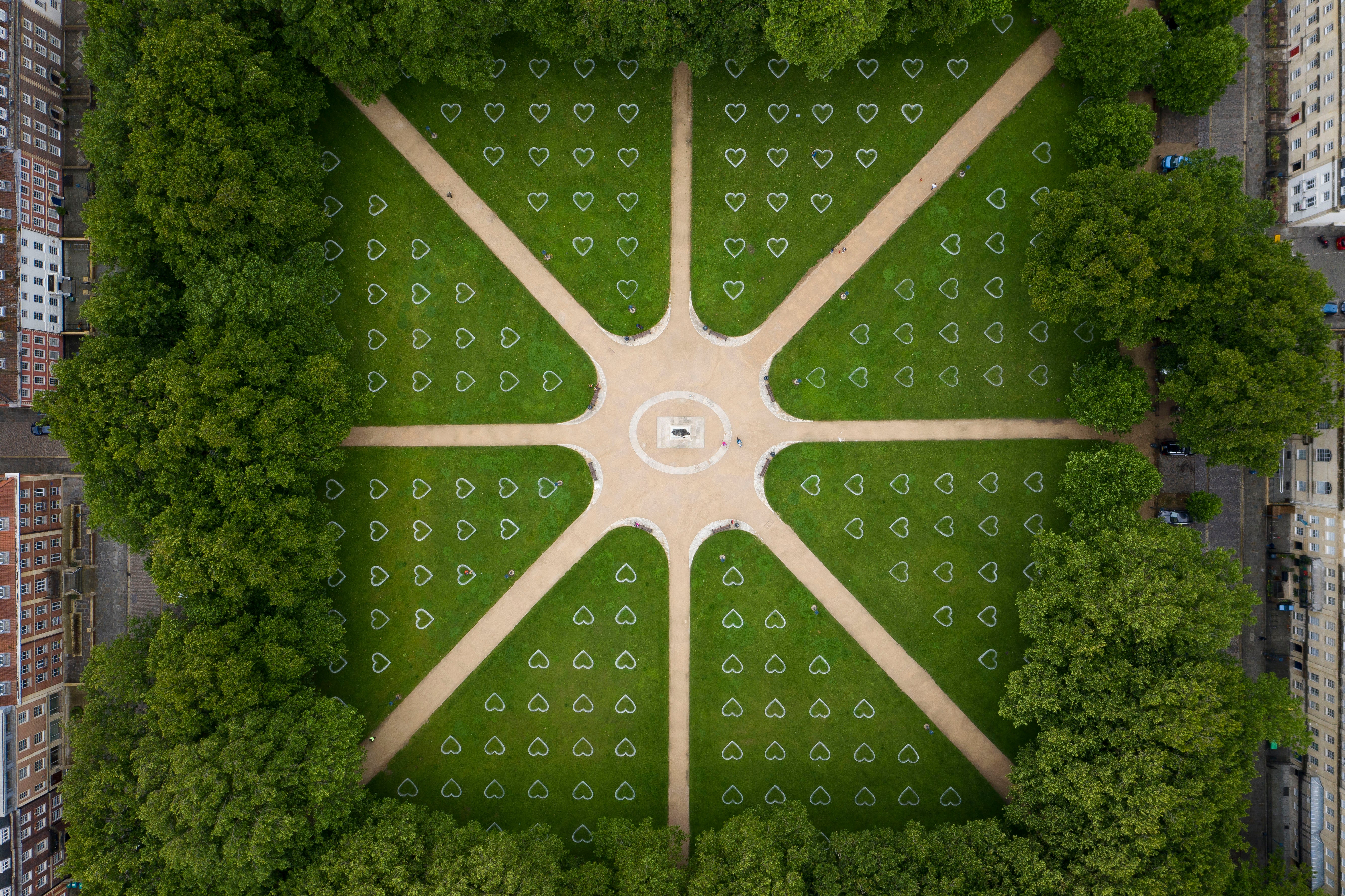 An aerial view of Queen Square where hearts have been sprayed onto the grass in an effort to encourage social distancing on 8 July, 2020 in Bristol, England.