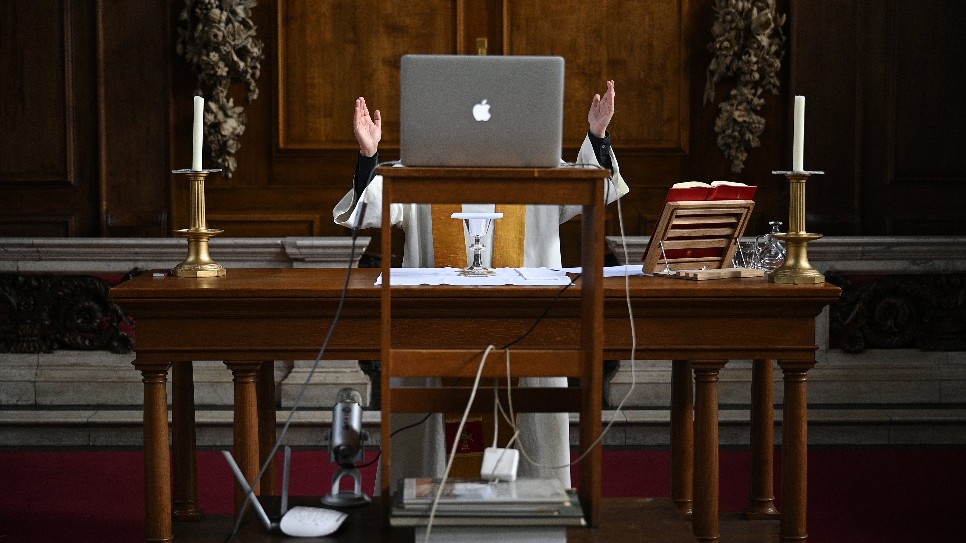 The reverend Lucy Winkett, rector of St James's Piccadilly, London, delivers a service on Rogation Sunday via webcam to the church's congregation while the pews remain empty on 17 May 2020