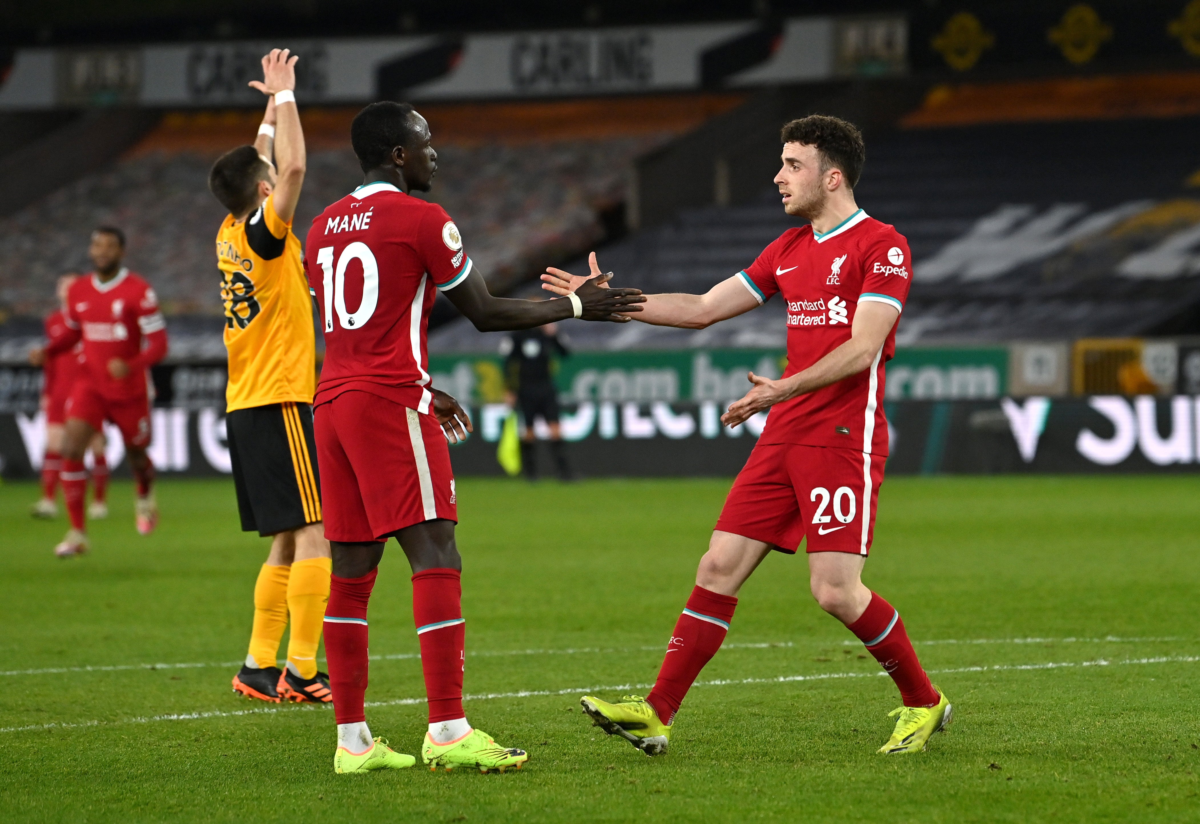 Jota and Mane celebrate the opener