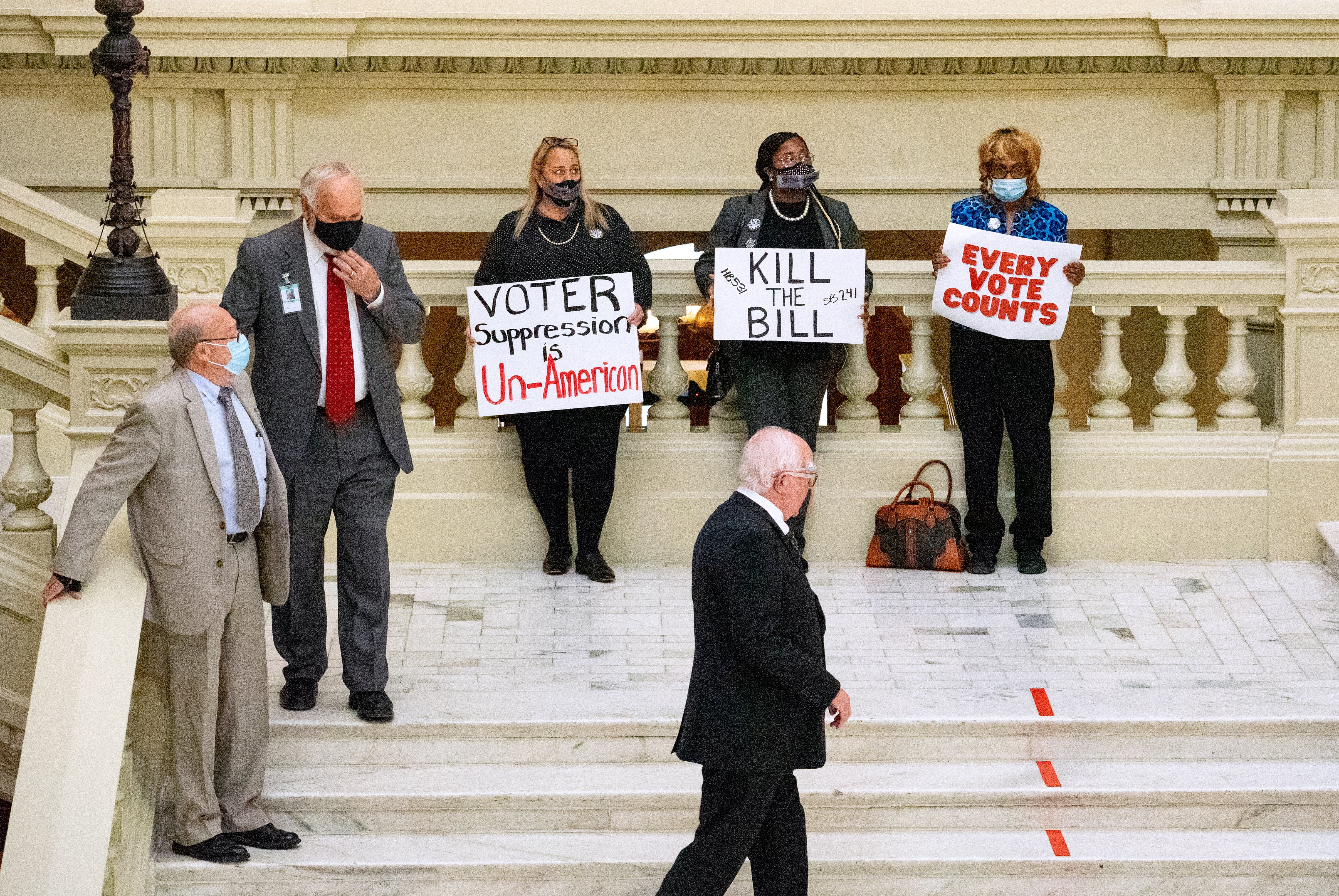 Demonstrators protest inside Capitol building to oppose HB 531 on 8 March, 2021 in Atlanta